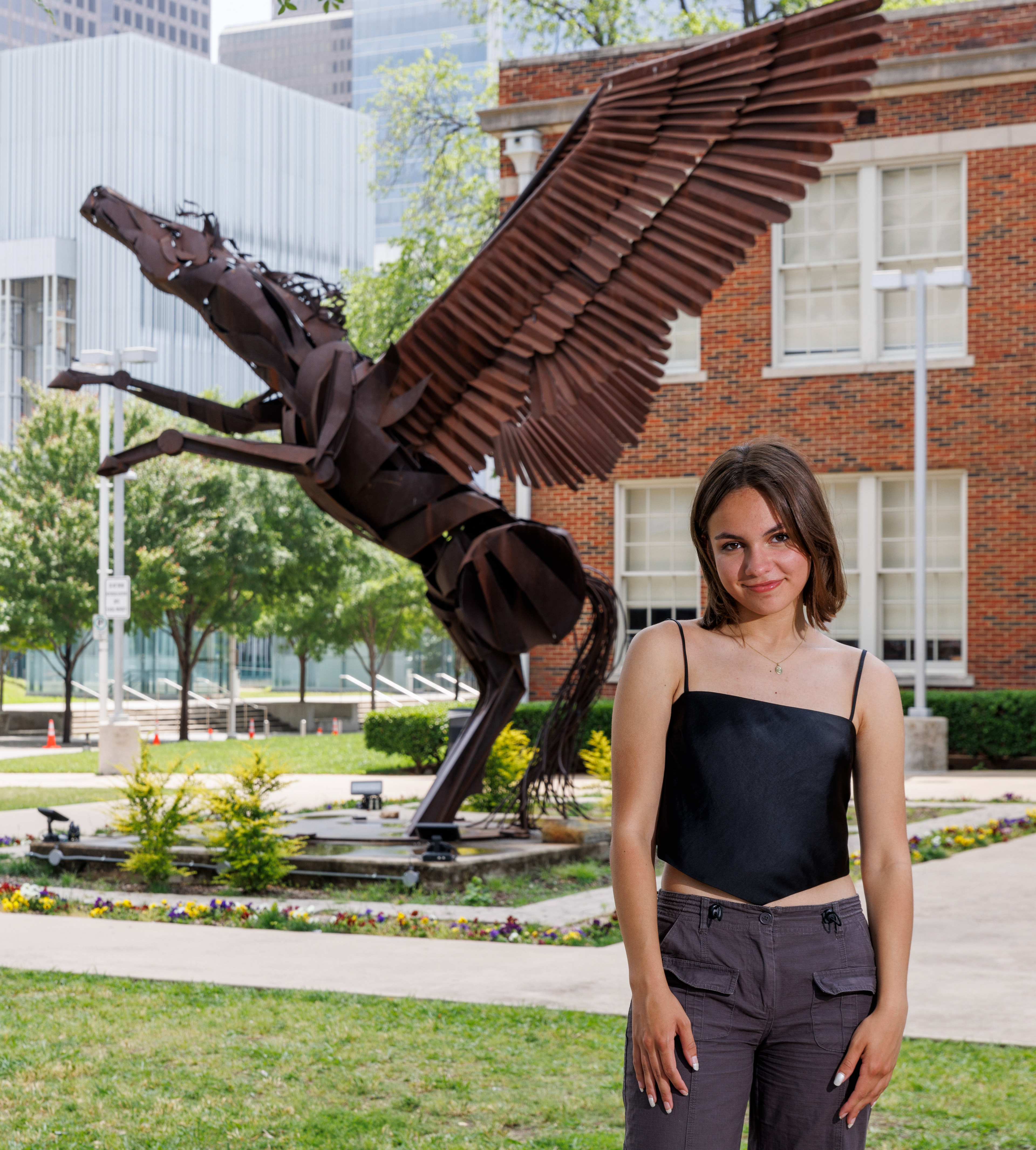 Isabel Gameros, 17, pictured outside of Booker T. Washington High School for the Performing and Visual Arts on Monday, May 8, 2023, in Dallas. Gameros was recently cast in the new Netflix series, Florida Man.