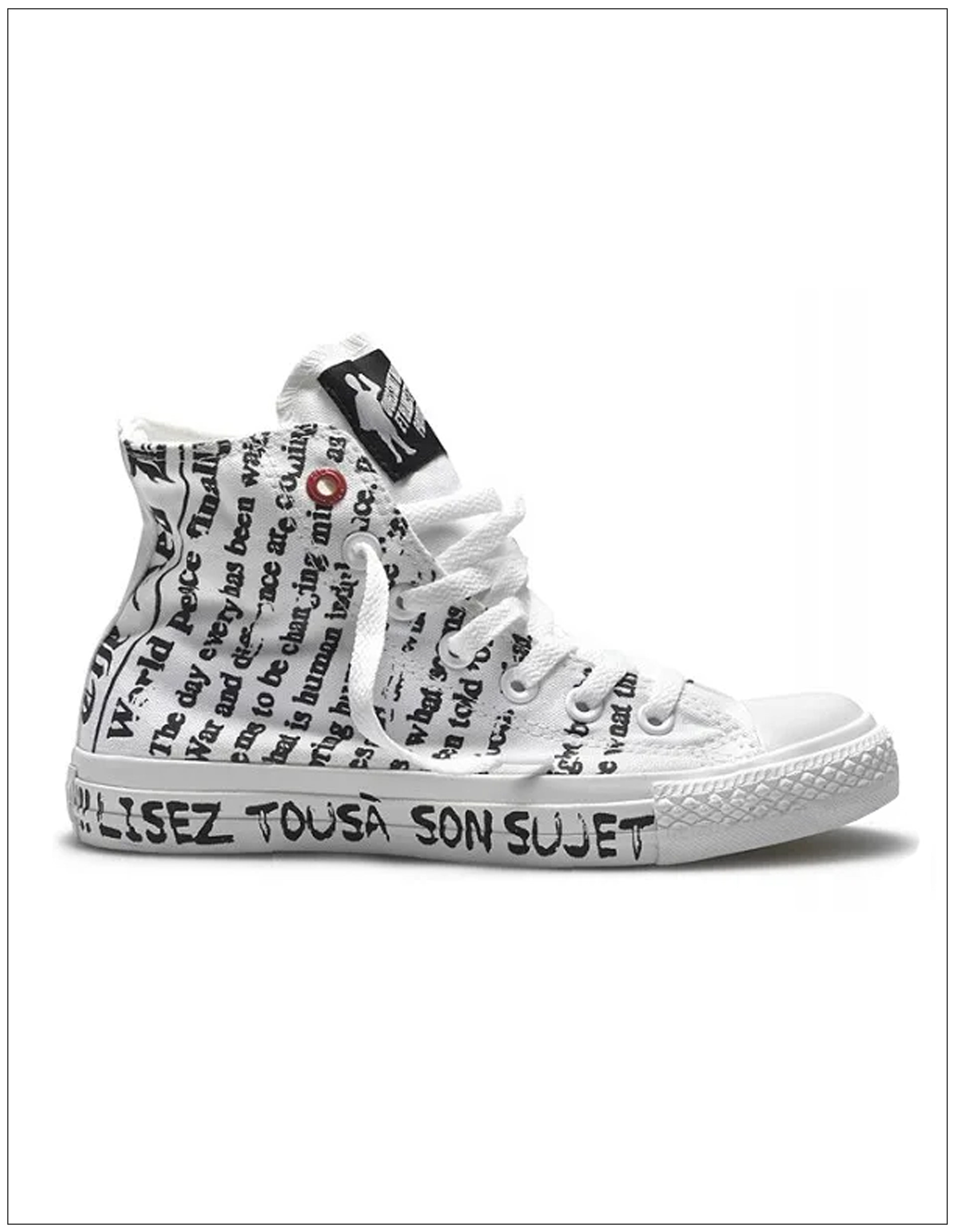 converse sneakers with writing and image of a newspaper  boy.
