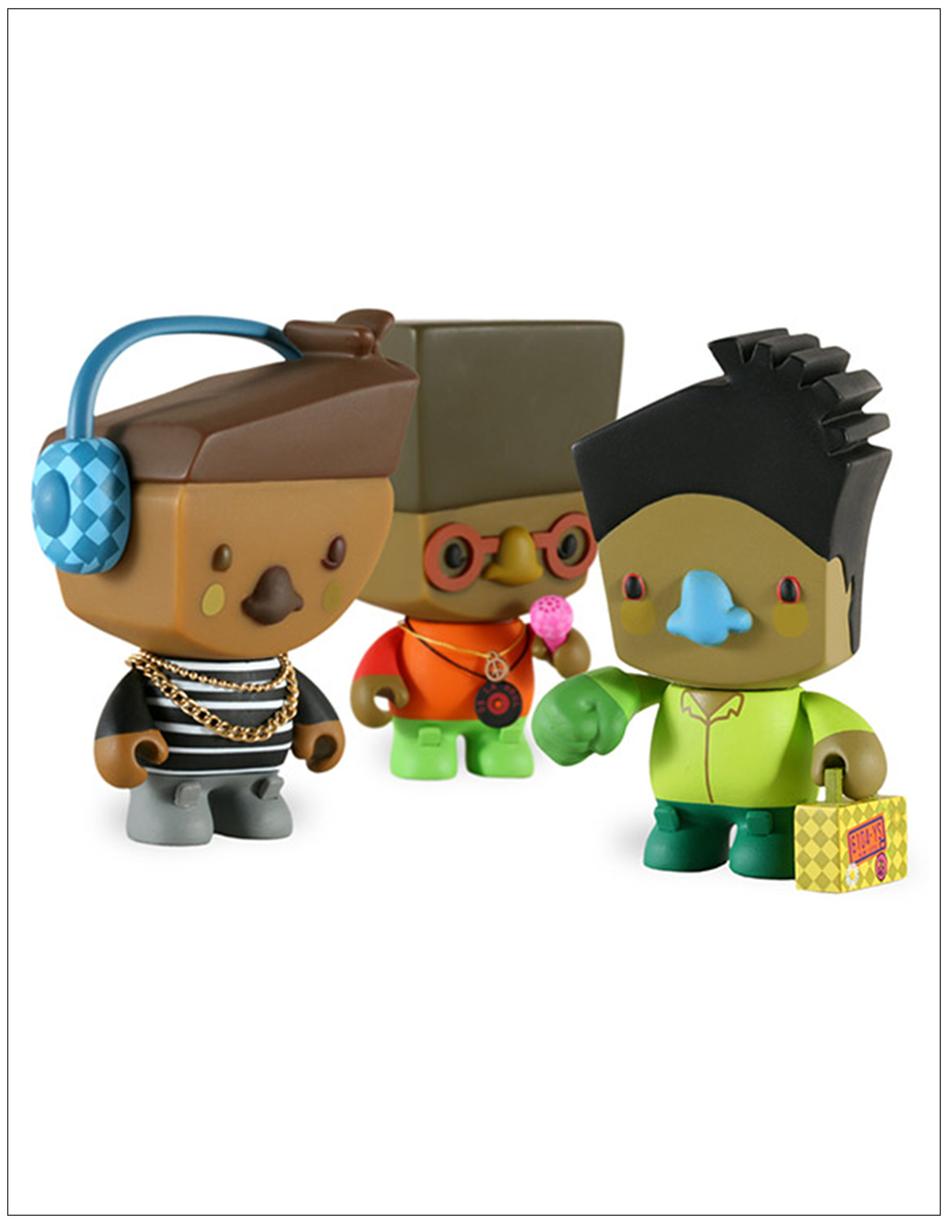 image of the small toys. one wearing headphones, one holding a microphone and the third holding a suitcase.