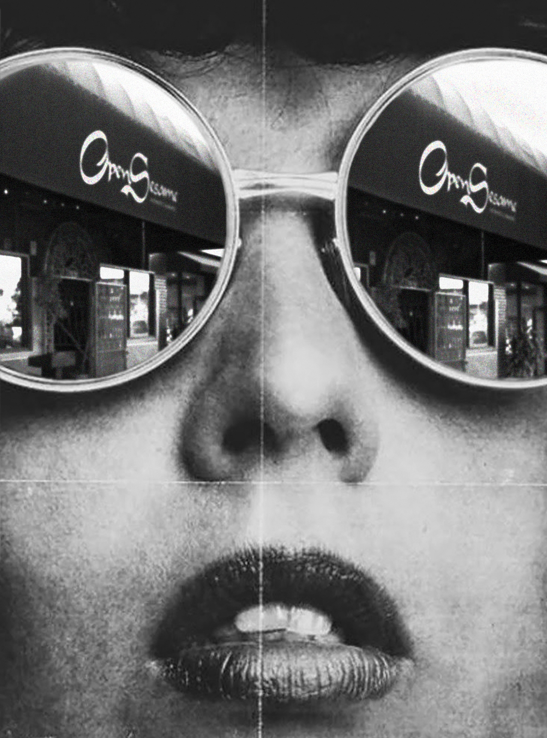 close up of woman's face with large rounded sunglasses with open sesame restaurant being reflected.