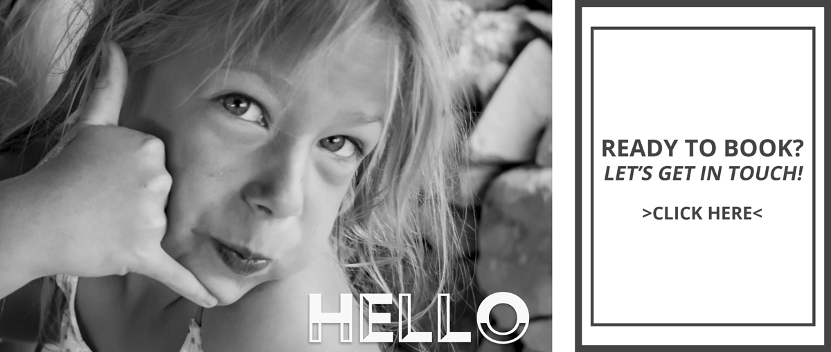 Documentary photograph of girl posing "call me". Taken by Callie Cooper.