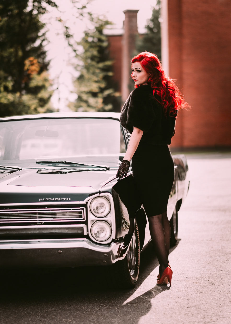 redhead and a plymouth