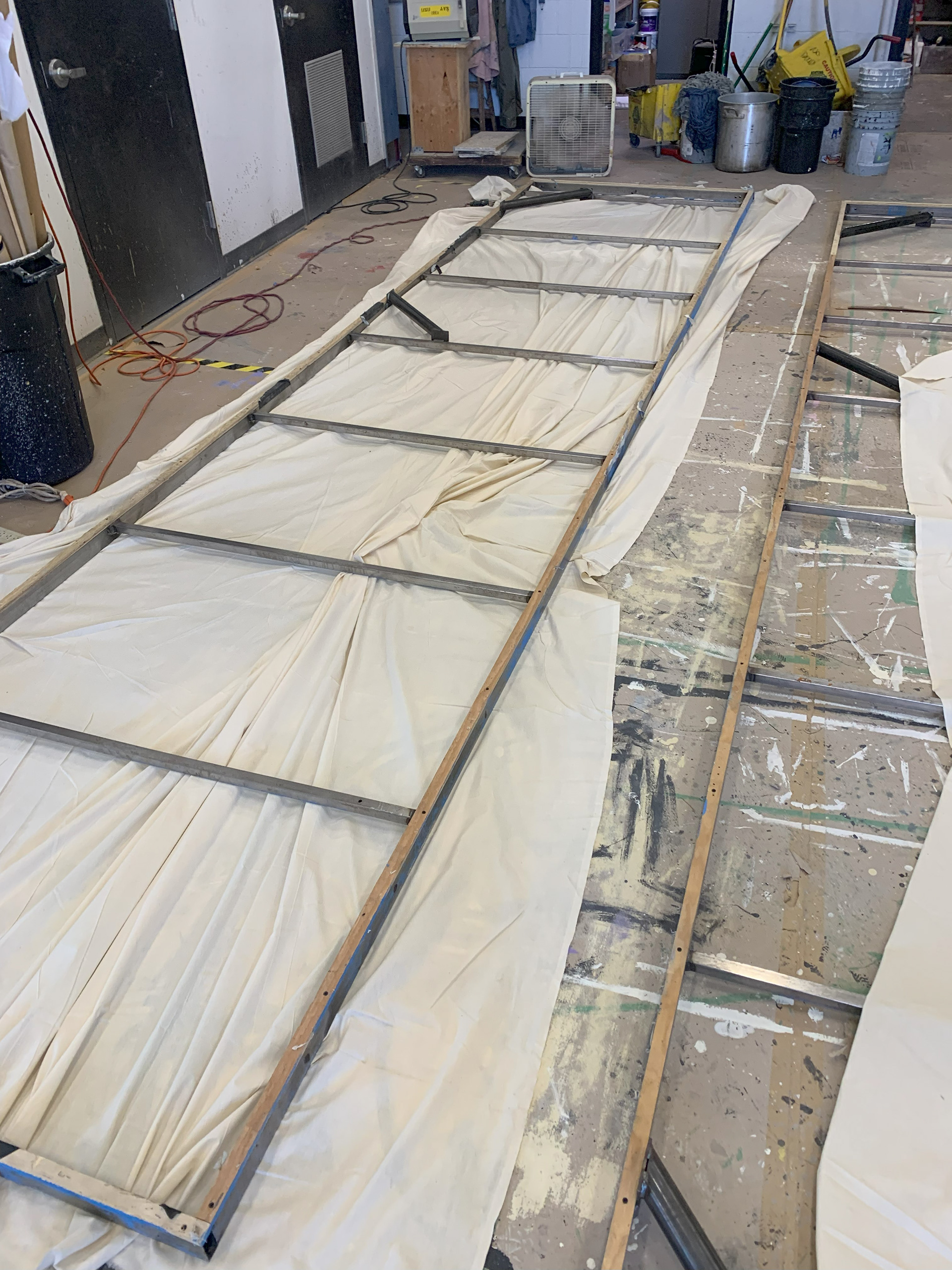 Stretching muslin fabric over frame