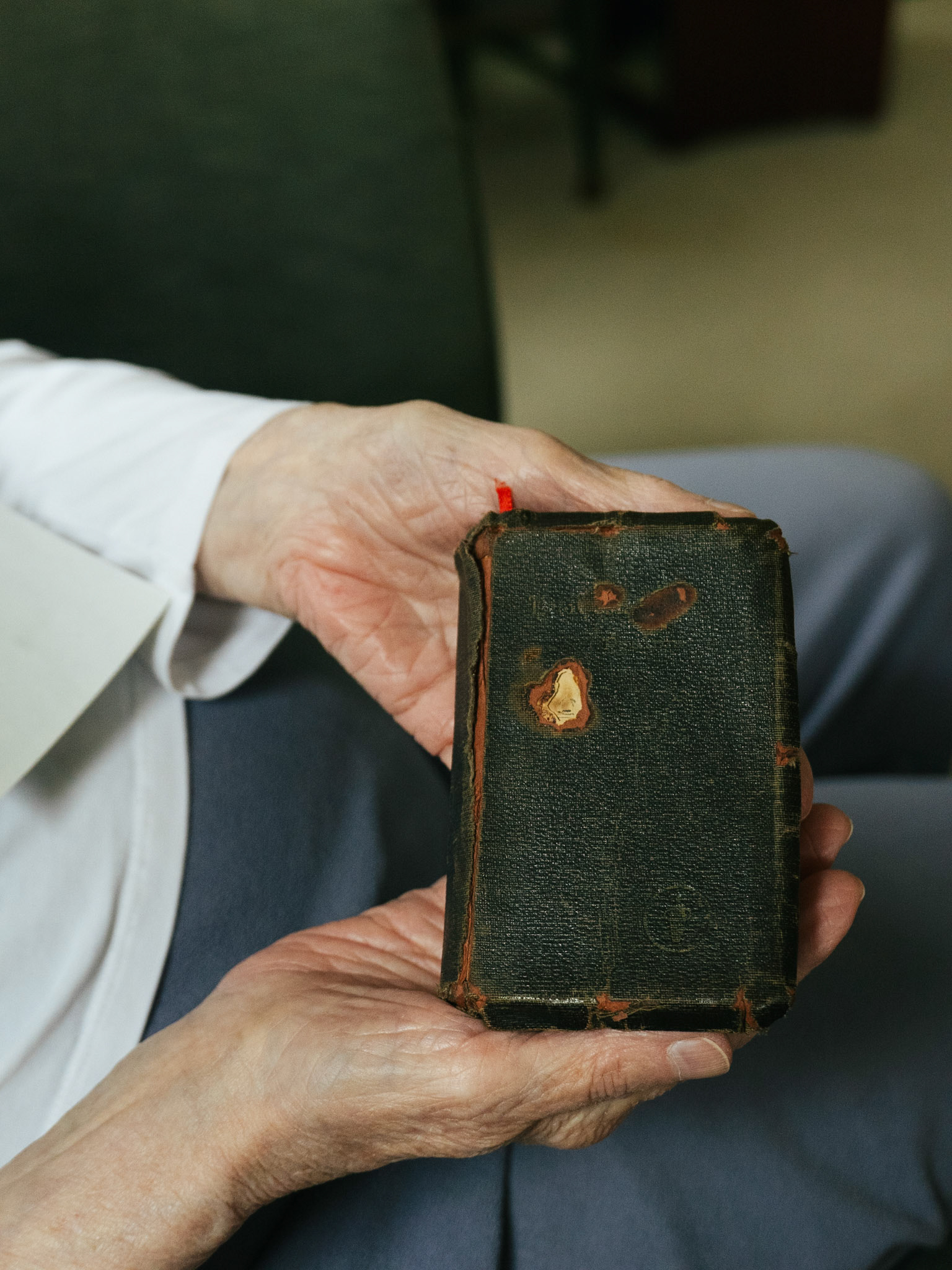Ralph's Bible from WW2. He wore a hole in the cover from where his thumb was because he gripped it so tight.