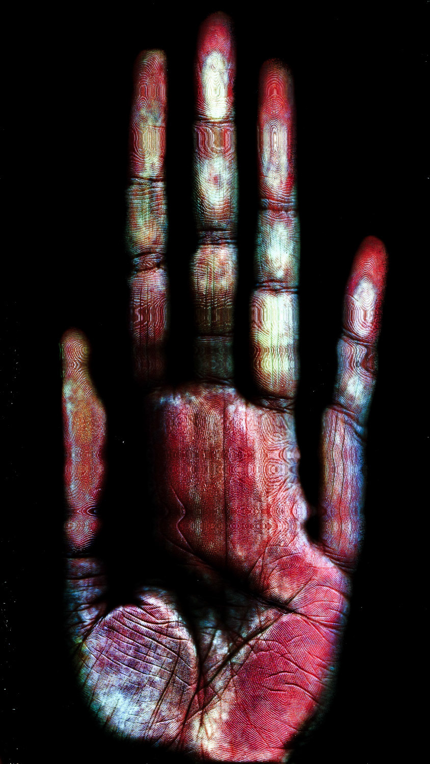 Ma main passee dans le scanner