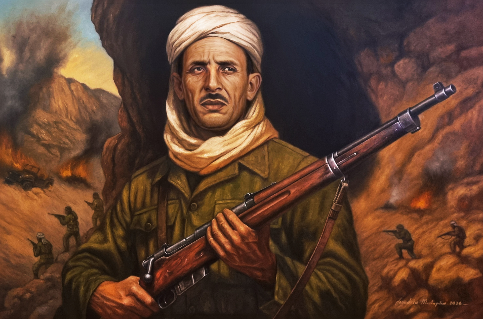 A realistic painting of Mostafa Ben Boulaïd during the Battle of Ifri El Belah in 1956. In the foreground, he is wearing an olive military uniform and a white turban, holding an old rifle with both hands, with resolute features. In the background, a mountainous battlefield appears with smoke and fire rising, soldiers in combat positions, and military vehicles, with the artist's signature and the year 2026 at the bottom.