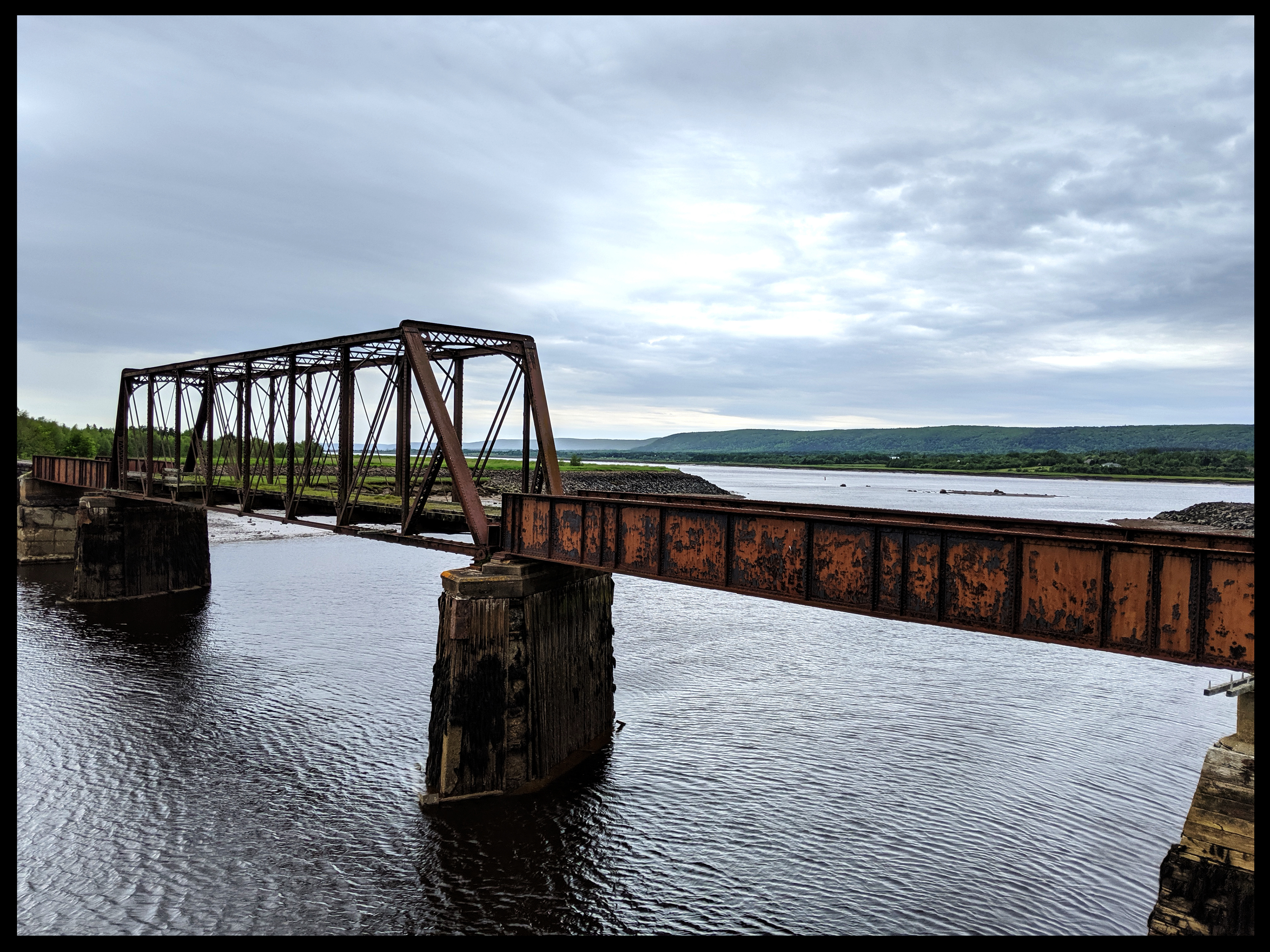 A rusting train bridge in Annapolis Royal, Nova Scotia