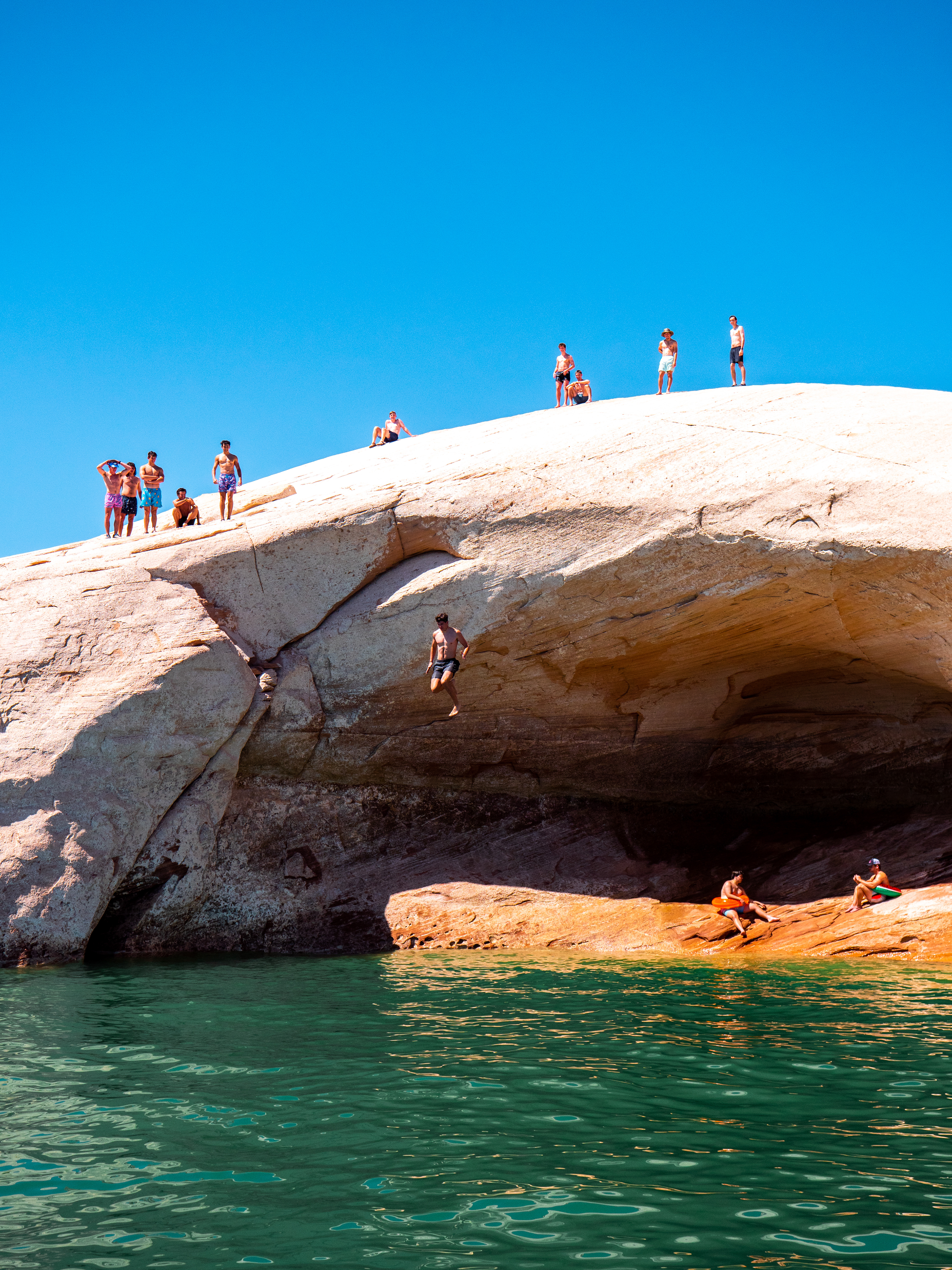 Cliff jumping into Lake Powell