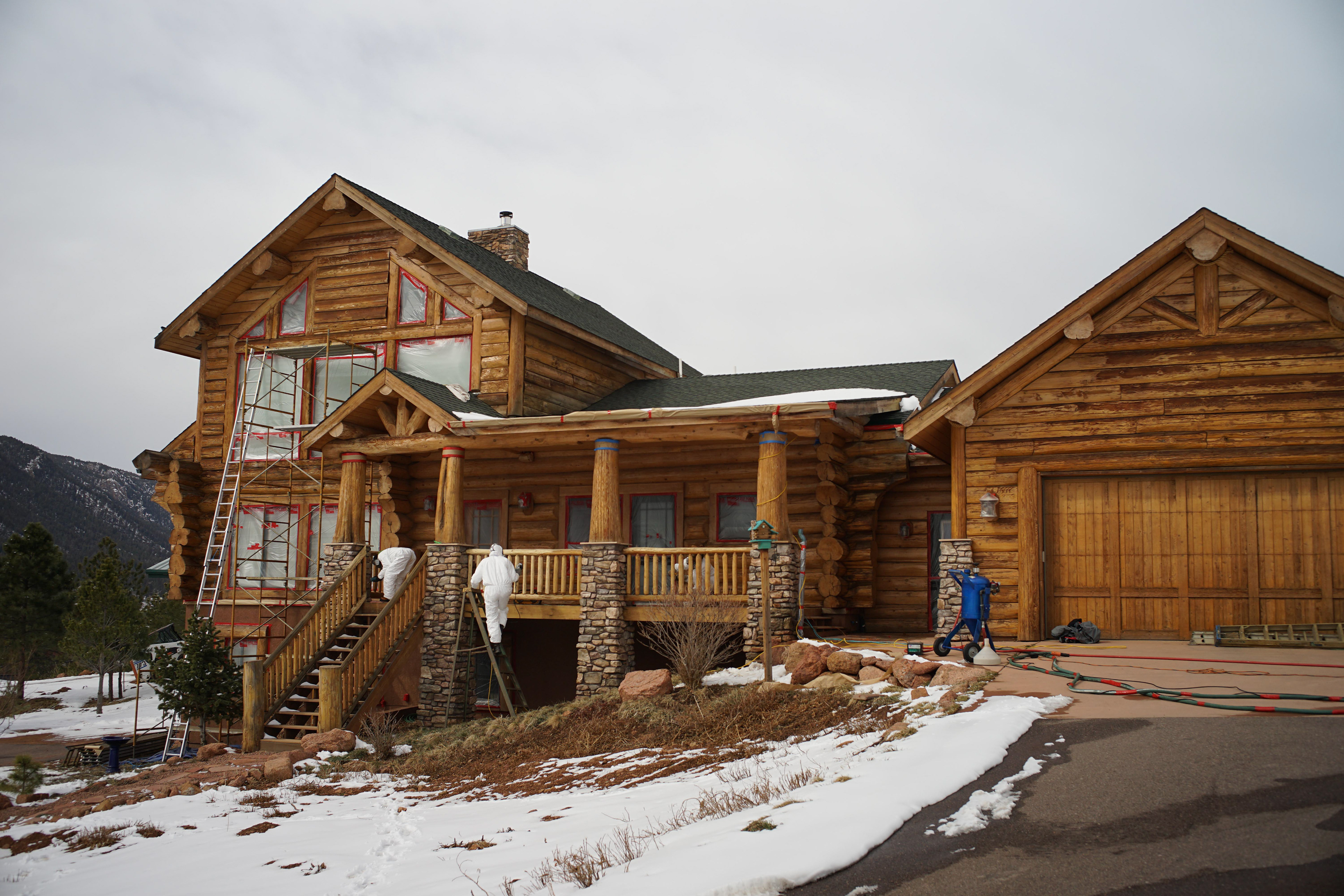 Snowy log cabin home in colorado springs on Craiyon