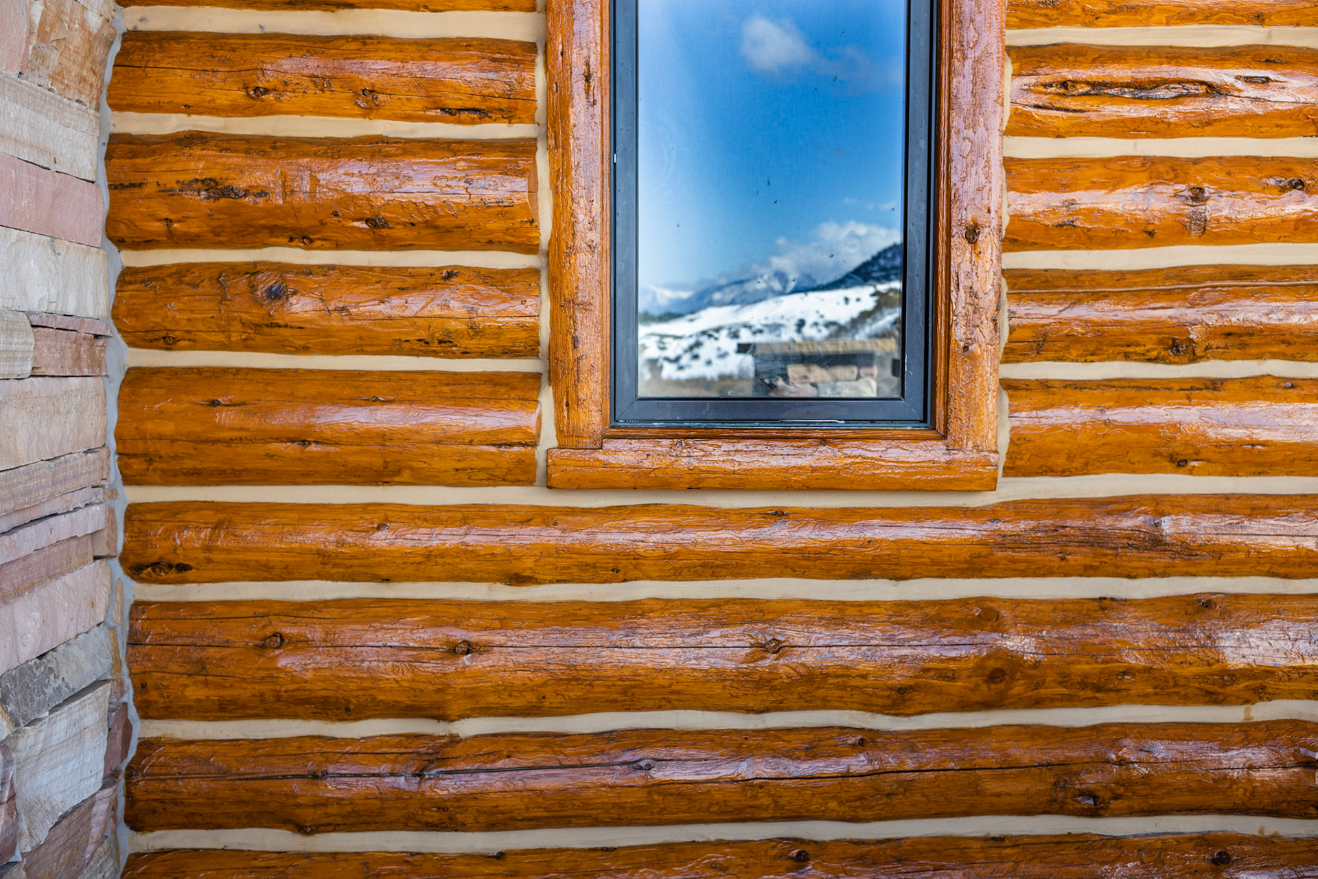 staining log cabin