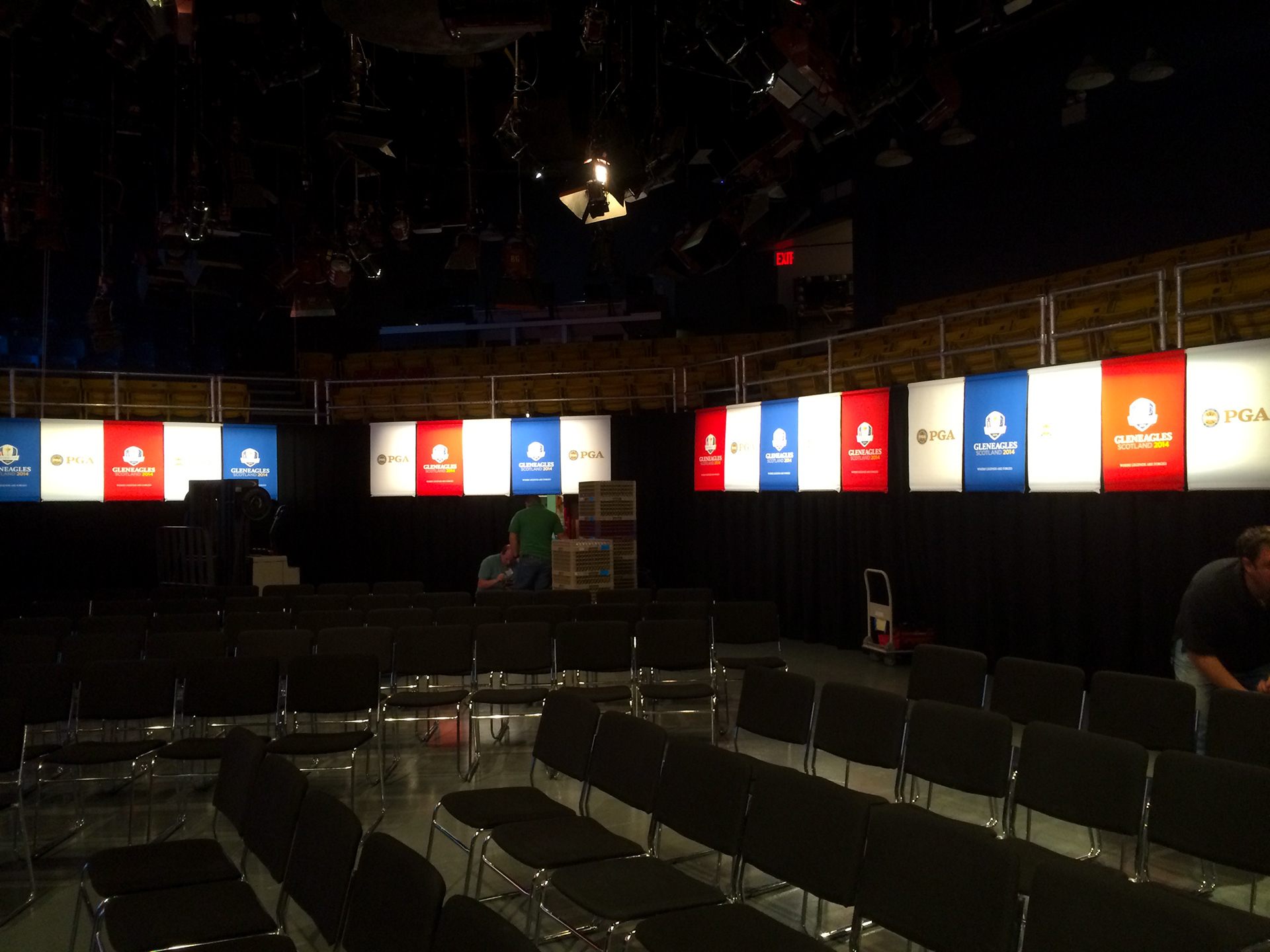 PGA of America branding surrounding the back of the studio