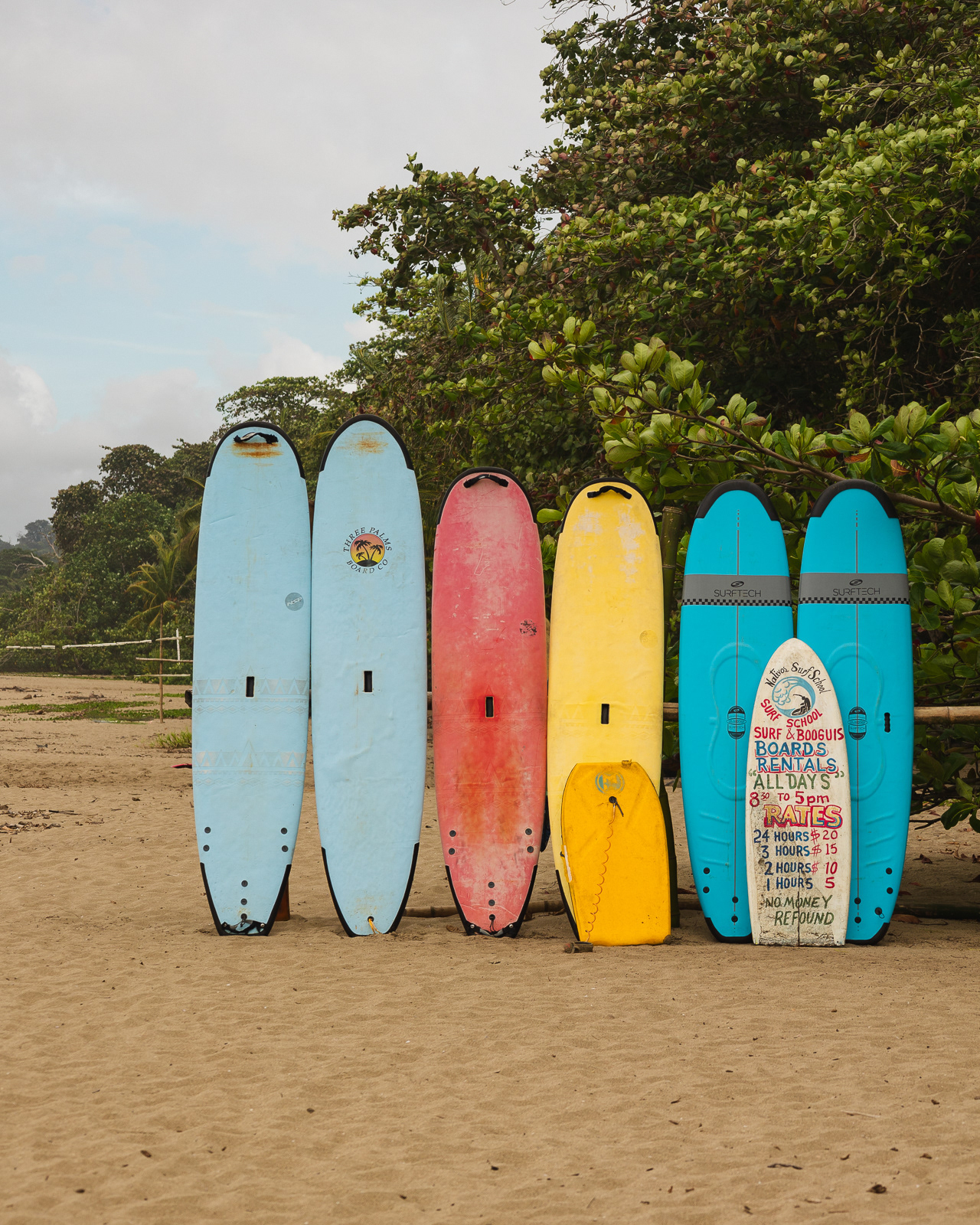Colourful surfboards on the beach in Puerto Viejo, Costa Rica