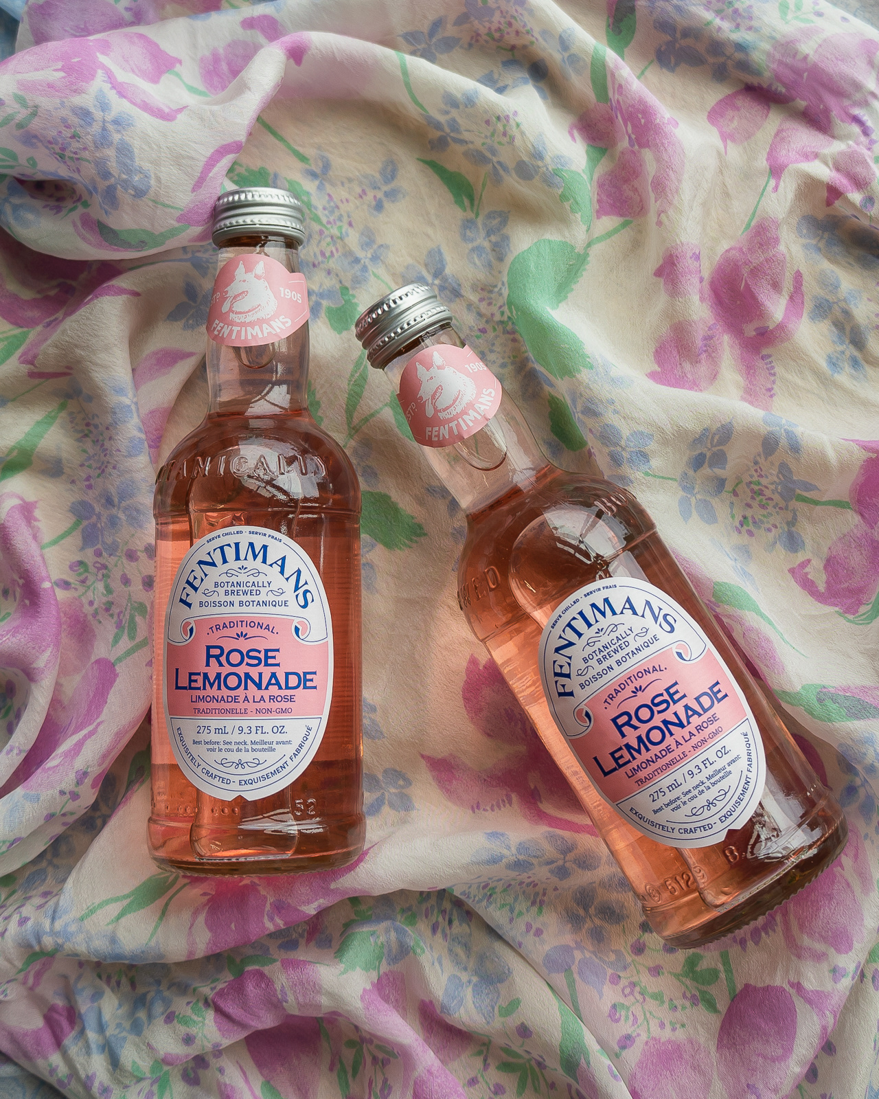 Flatlay of two bottles of pink lemonade