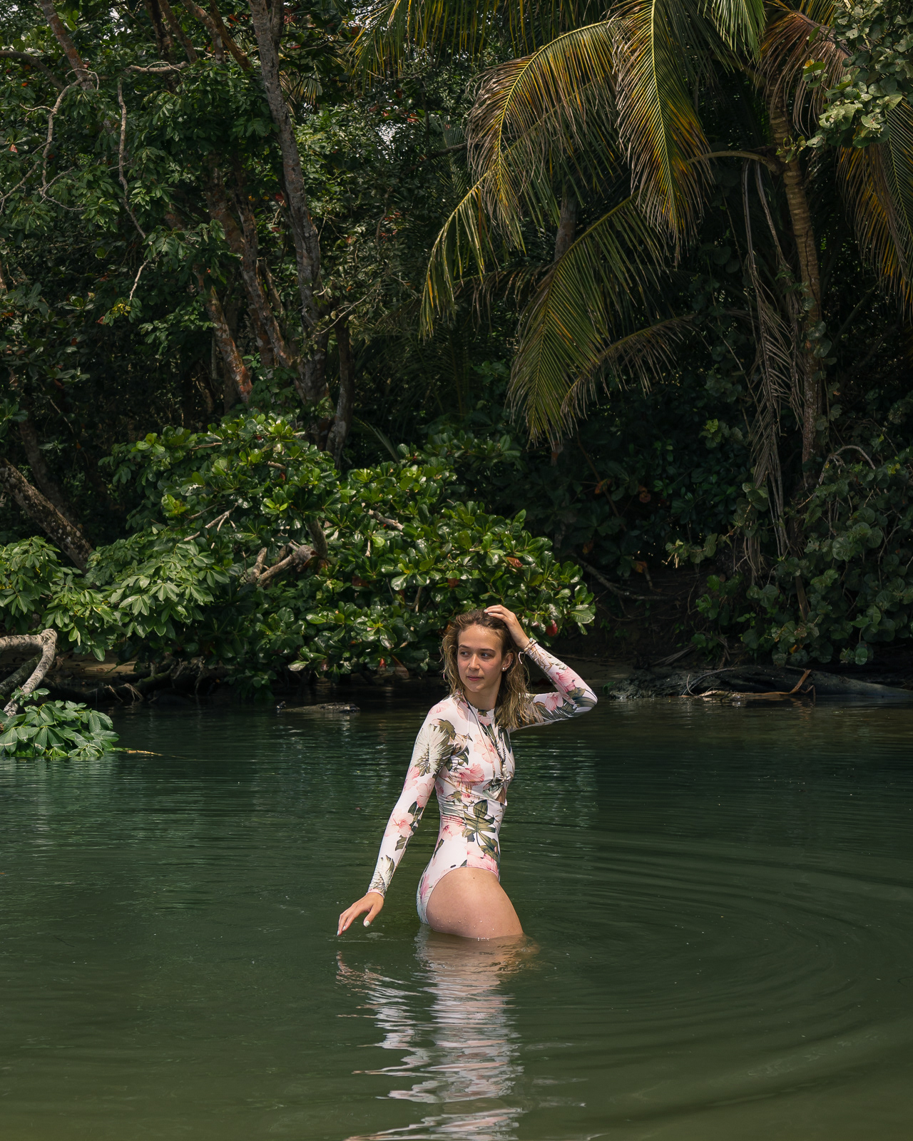 Woman in the water in Costa Rica's jungle