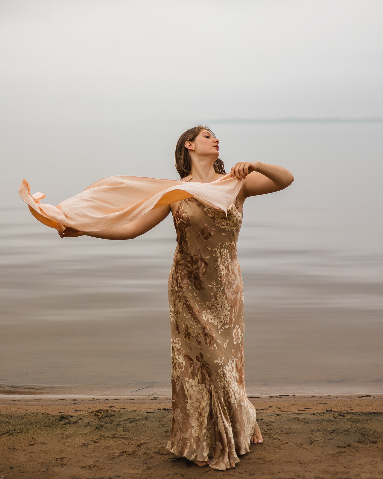 Portrait of a woman in front of a foggy lake in Montreal
