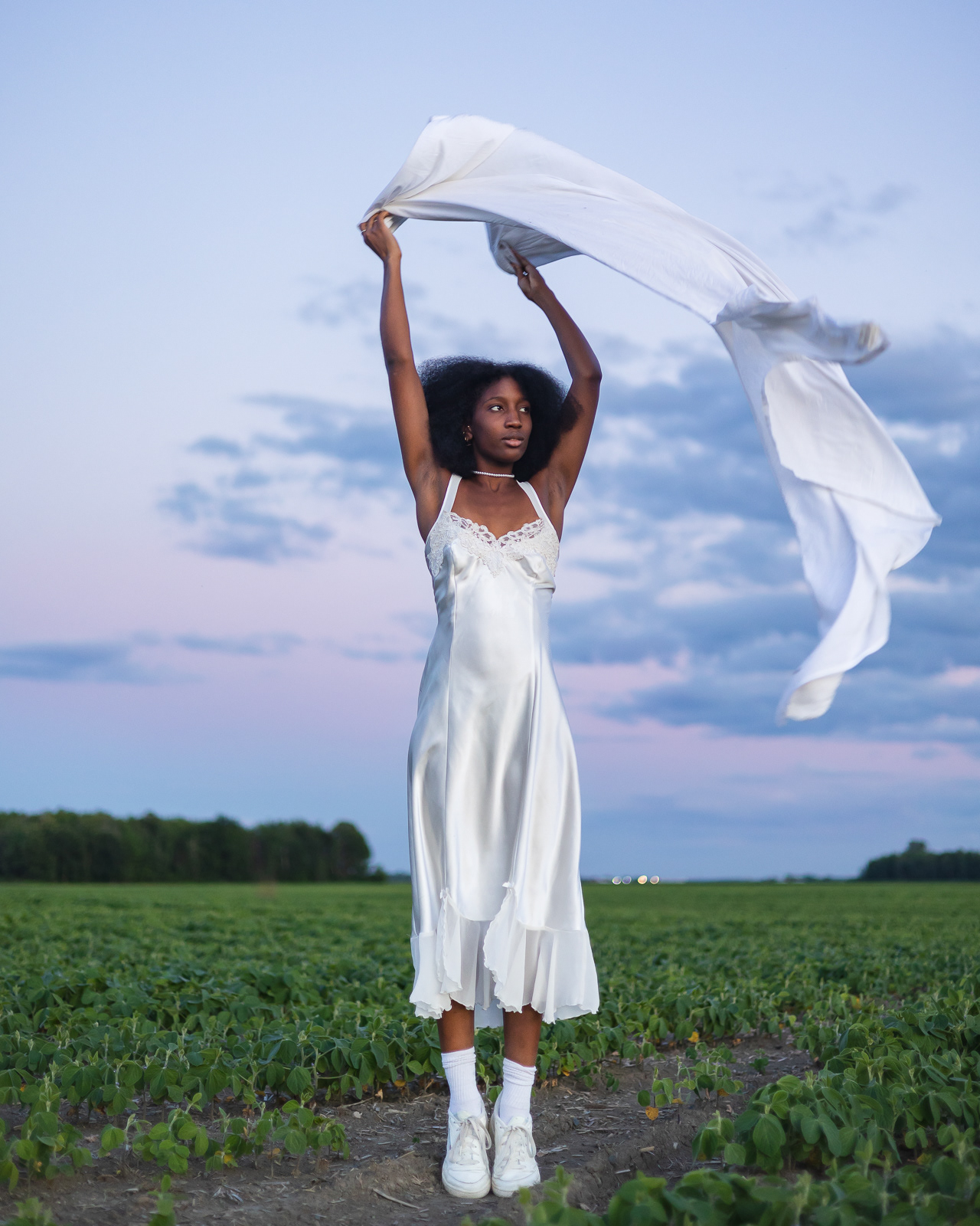 Portrait of a woman in a field in Montreal