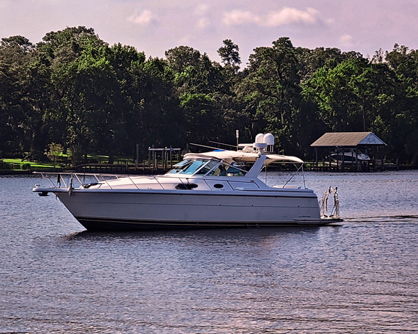 Our broker, Tom, takes our photo as we leave Lambs Marina...
