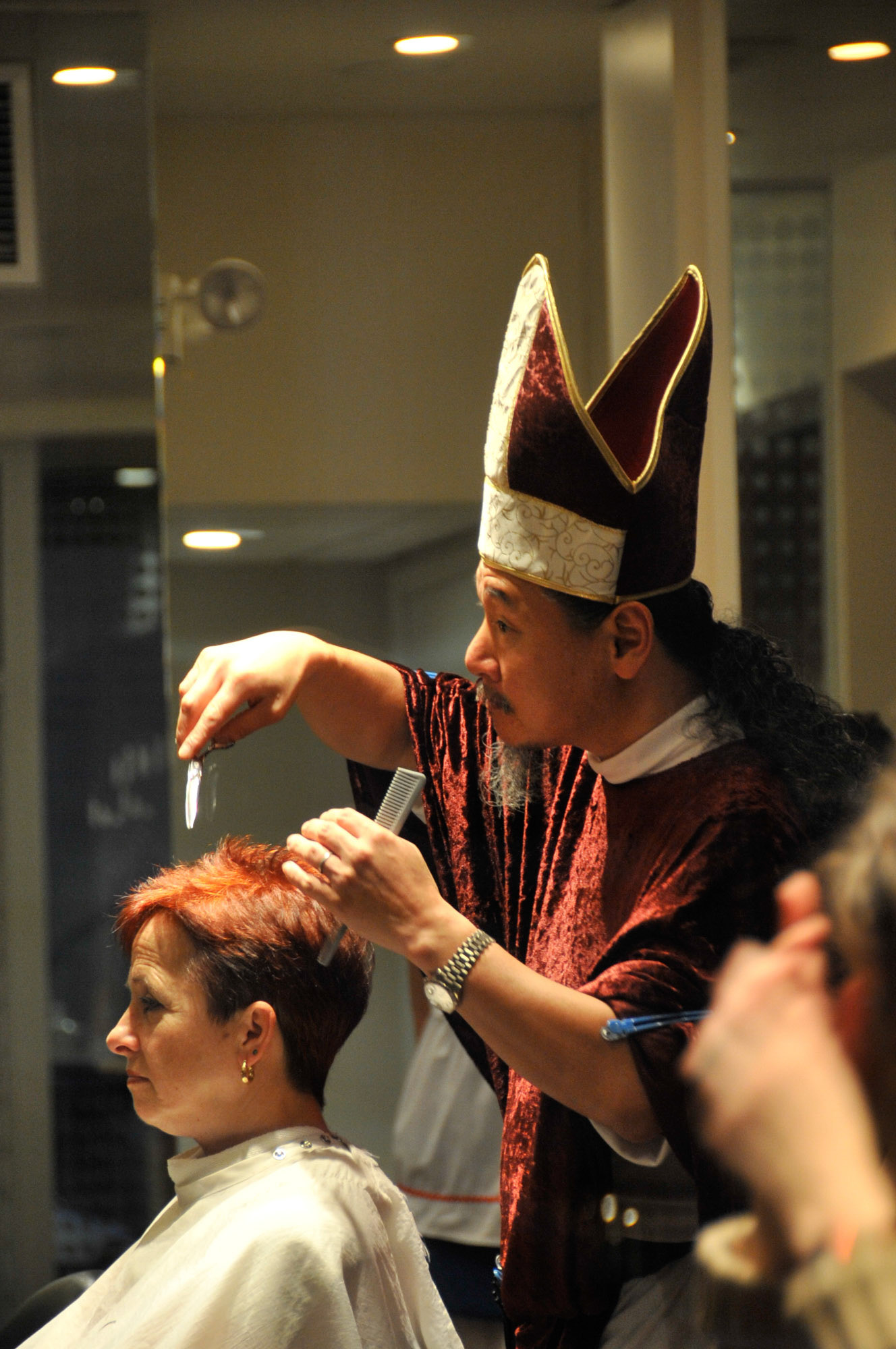 Bishop Cutting Hair