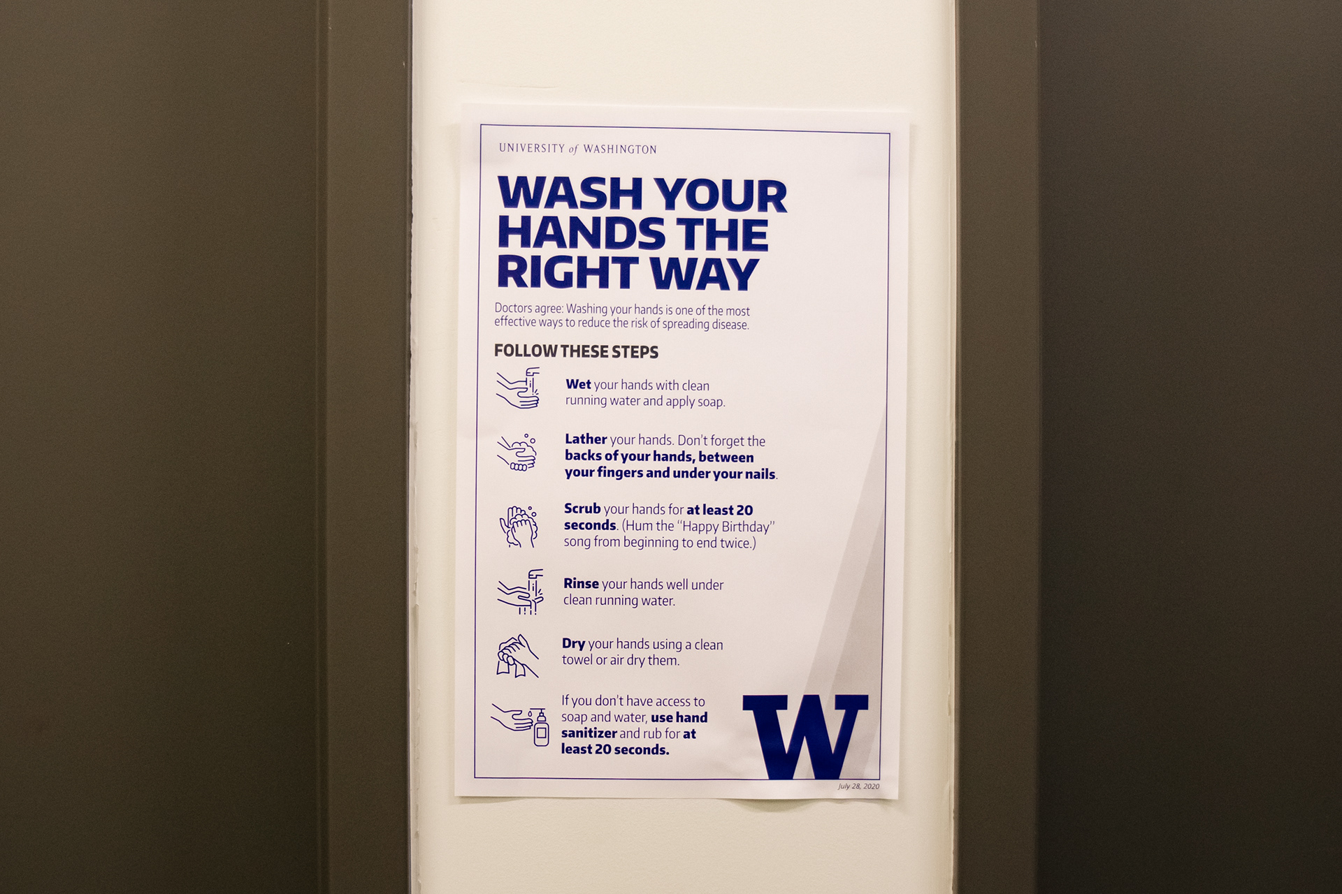 A COVID-19 informative poster at The Mill at the University of Washington in Seattle, Wash. on Thursday, Oct. 26, 2023. The poster provides instructions on effective hand-washing and is posted next to the bathrooms in the building. (Photo by Chloe Sarmiento) 