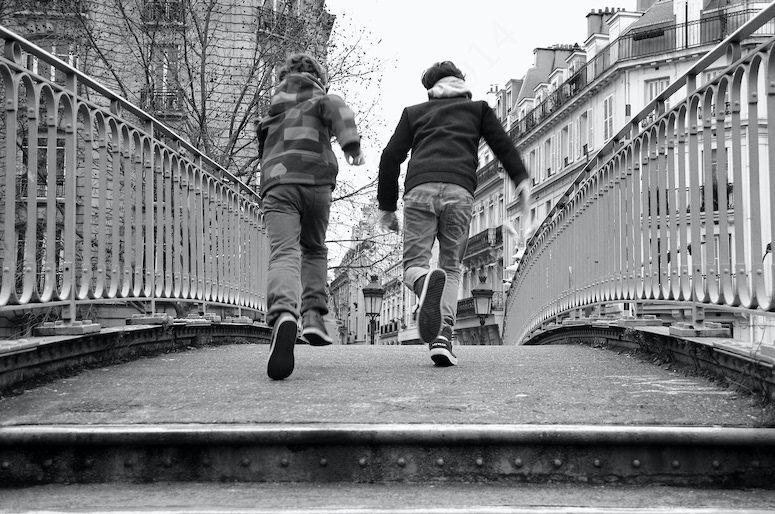 Boys running (Paris, France)