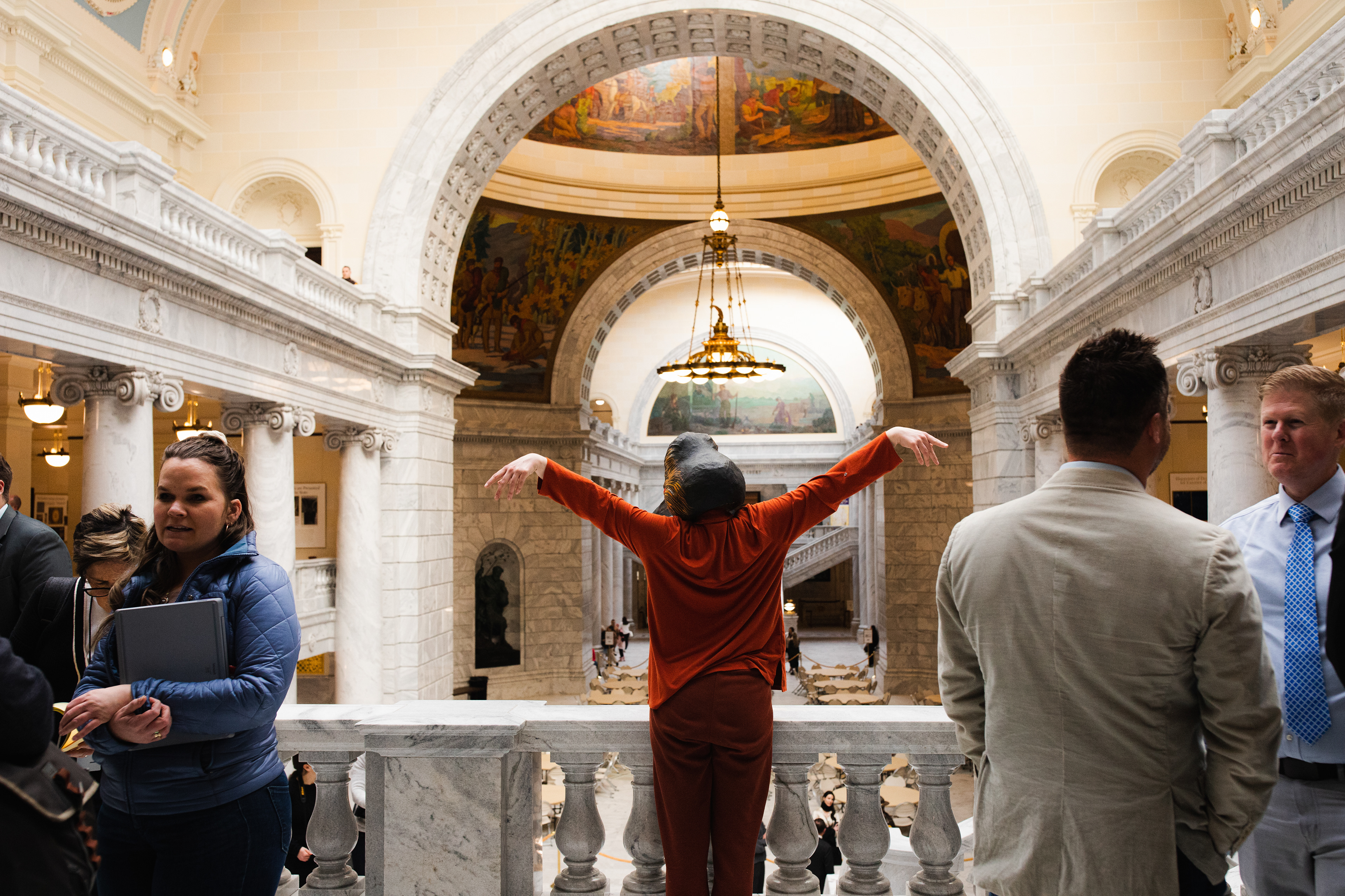 Sarah moves as Grebe in a piece performed at Utah's 2024 legislative session. Collaborators are Rae Luebbert and Bryn Watkins. Photo by Ash Gerlach. Masks by String and Shadow.