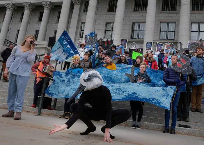 Sarah and Bryn Watkins perform at the 2024 listing rally for Wilson's Phalarope. Photo by Francisco Kjolseth.
