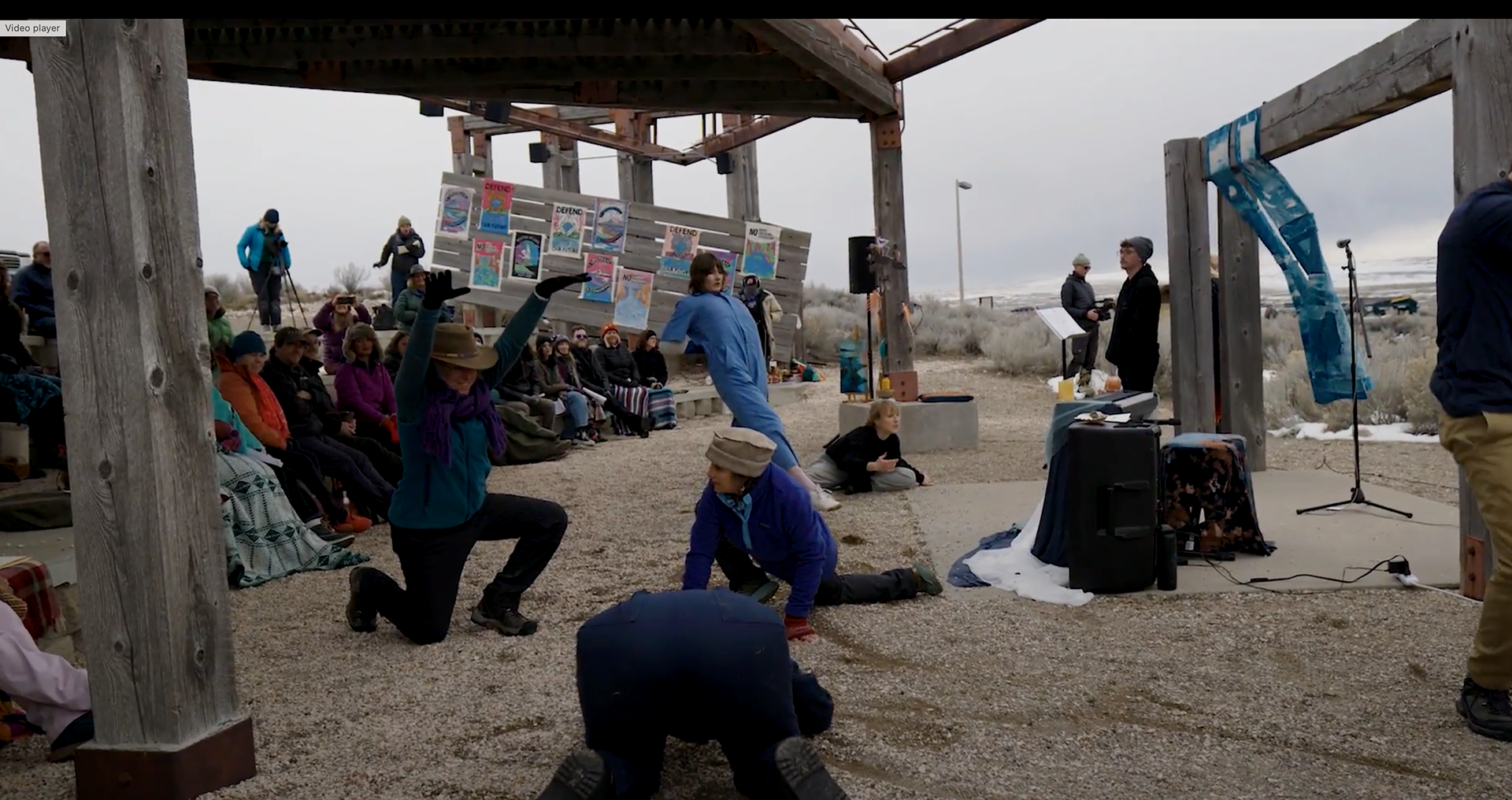 Community volunteers become lake beings, offering movement to the lake in an embodiment practice led by Sarah at the 2022-2023 Great Salt Lake Vigil.