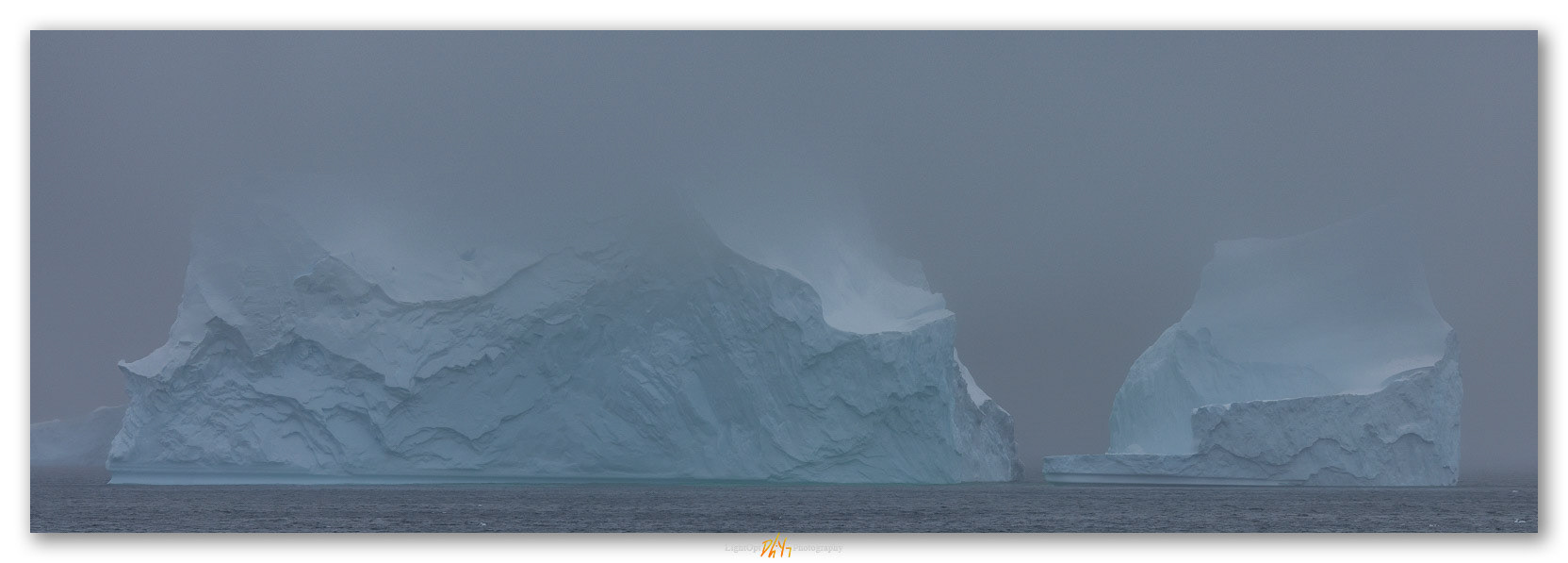 Blockade. Icebergs cluster in a bay along the Antarctic Peninsula