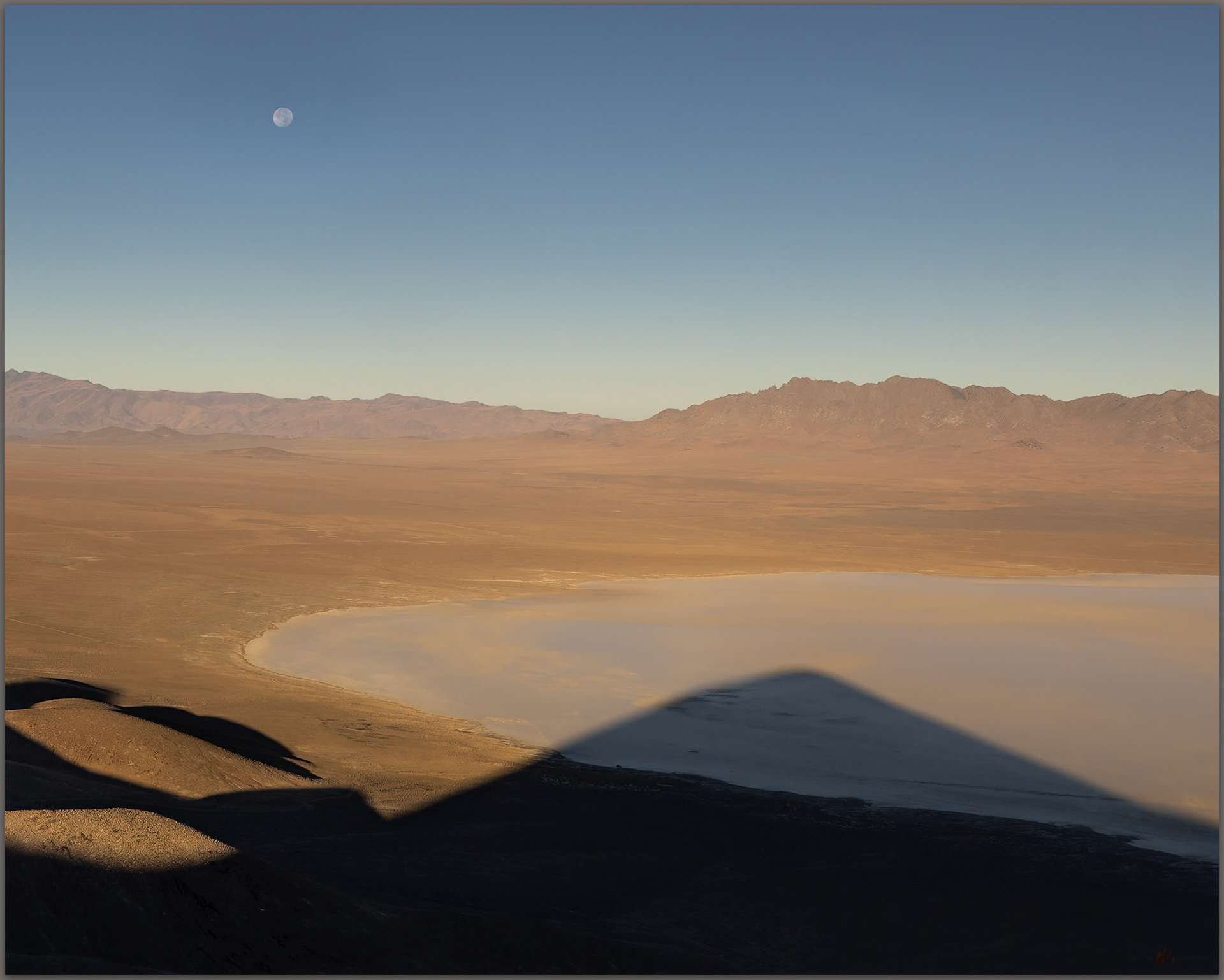 Mountain shadow. Walking the southern limb above Bluewing Playa, Great Basin Desert, NV