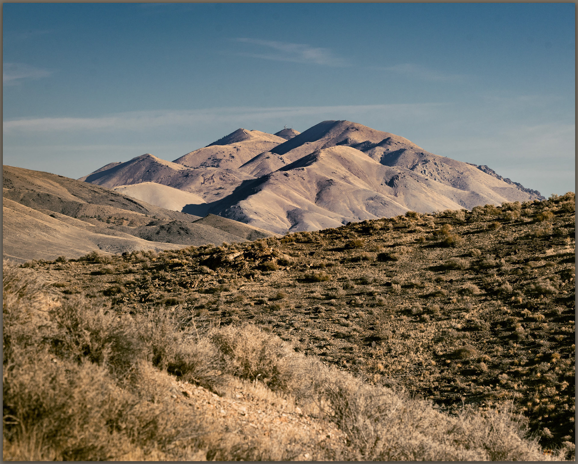 Fairview Peak. Fairview Peak stands above the north end of the Sinkavata Hills, Great Basin Desert, Nevada, USA