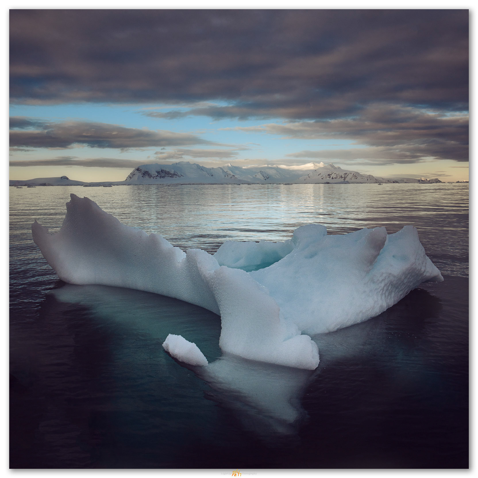 Ice flower. The melting bloom of a waterworn iceberg, Antartica Peninsula