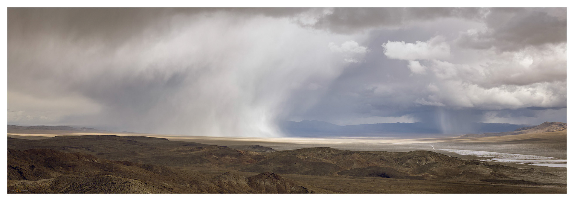 Torrential graupel storms track across Stonewall Valley toward Mud Lake playa.