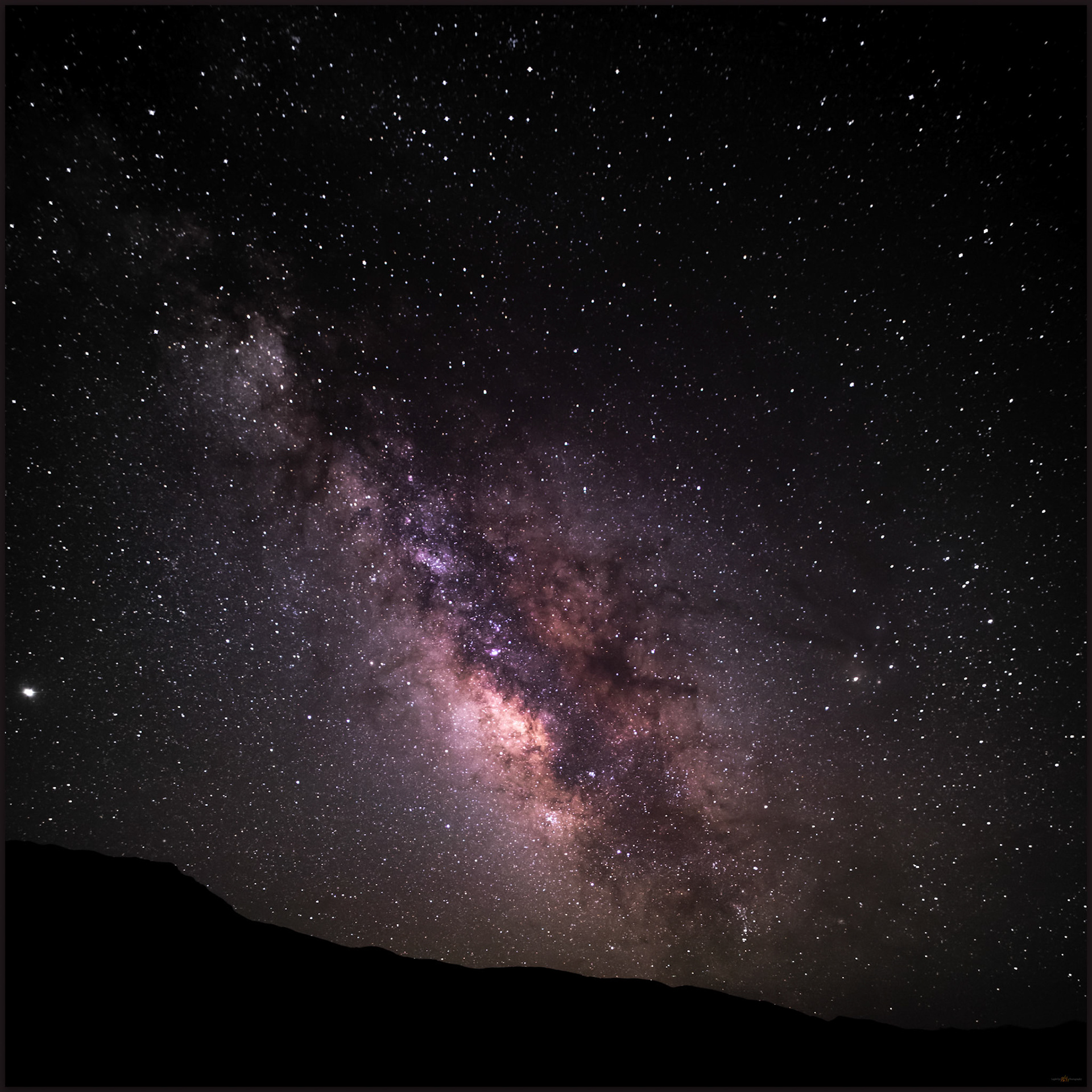 Overhead. Milky Way above the hills of Jersey Valley, Great Basin Desert, NV, USA