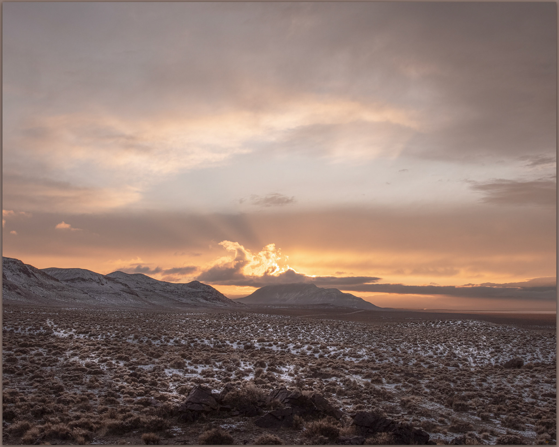 Traces in the snow hint at the old roads above the playa margin, it also makes sublte pattern through the image, Black Rock Desert, Great Basin Desert, Nevada, USA