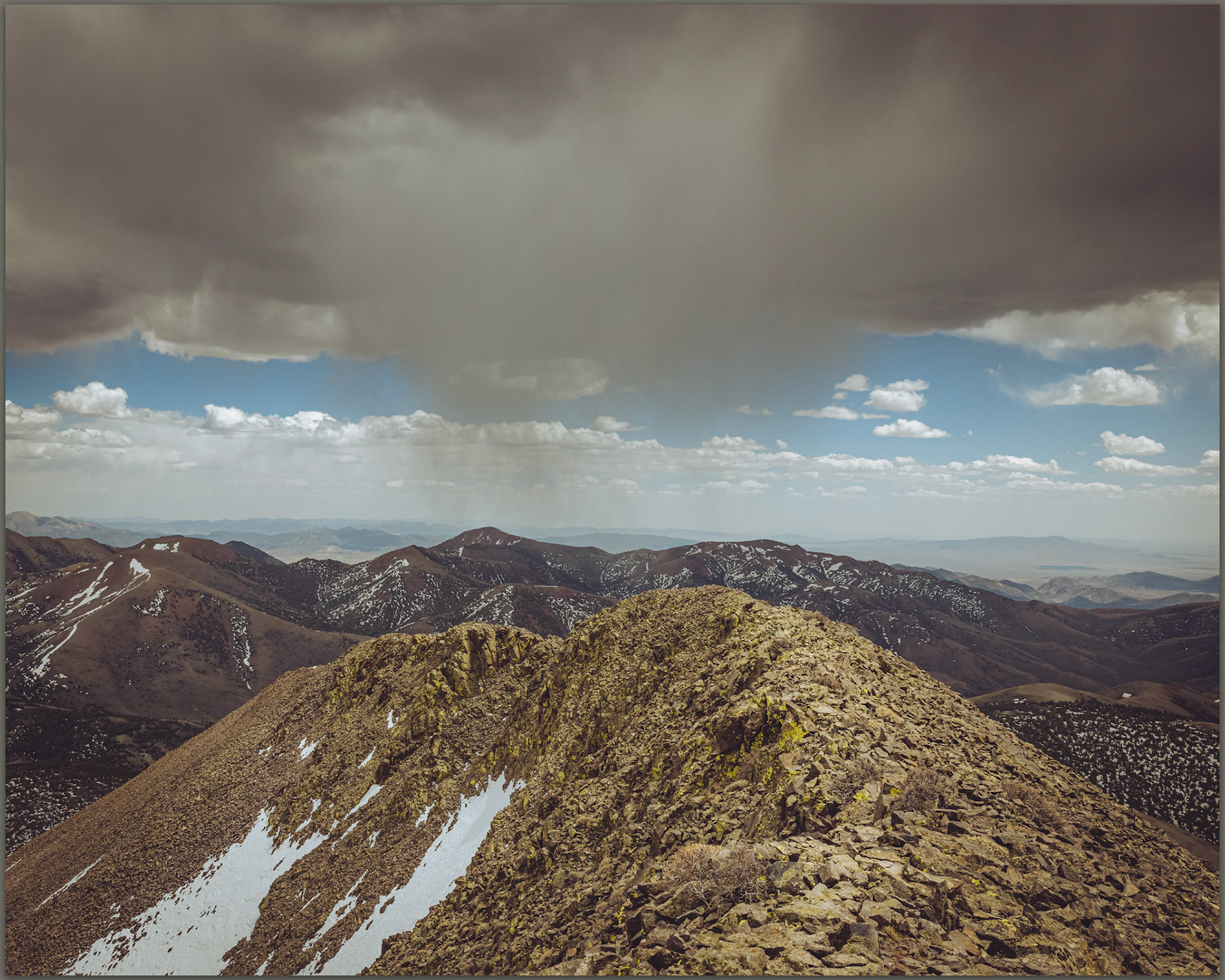 A springtime squall approaches the south summit ridge of Arc Dome, Toiyabe Range, Nevada., USA