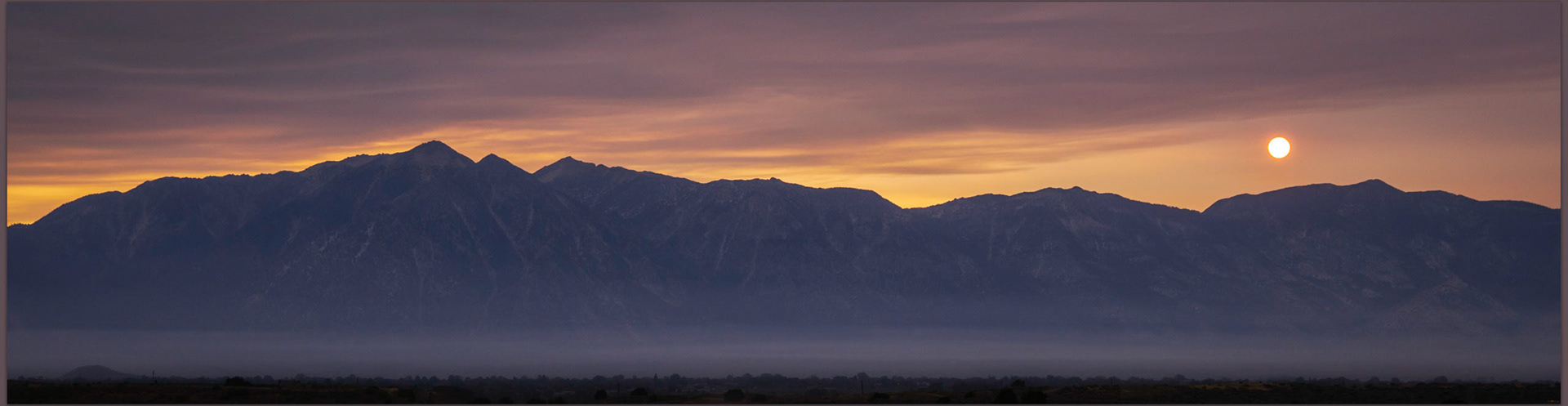Last sun. Smoke-filled sunset over Carson Valley, NV, USA