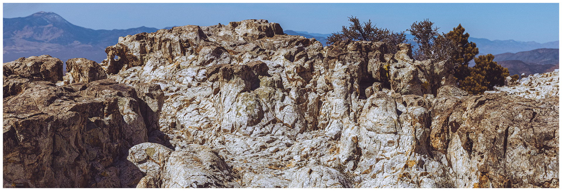A turret of limestone and small arch on the cliffs of Mount Irish, Nevada.