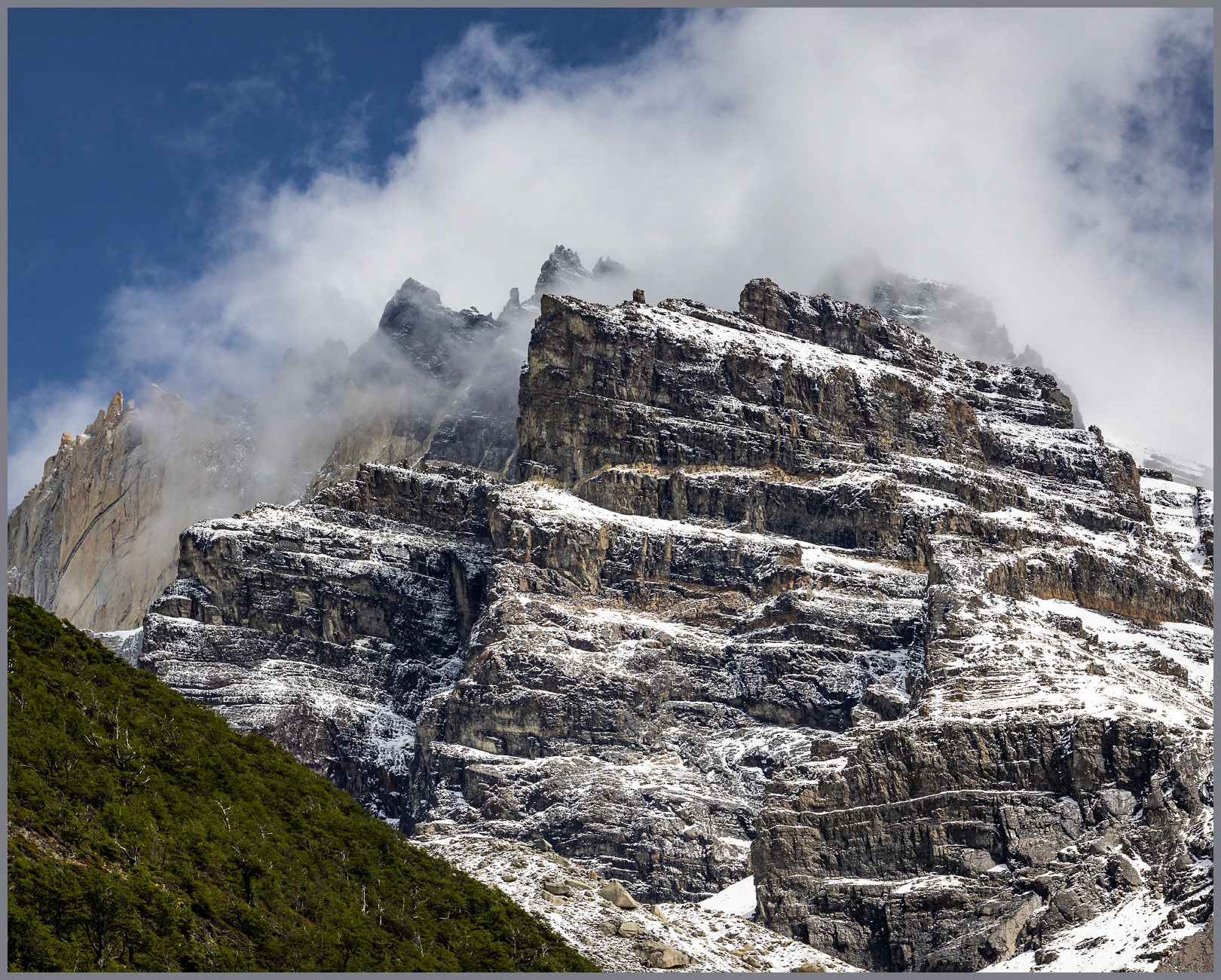 Clearing. The squalls leave the towers of Cerro Torre, Torres del Paine National Park, Chile