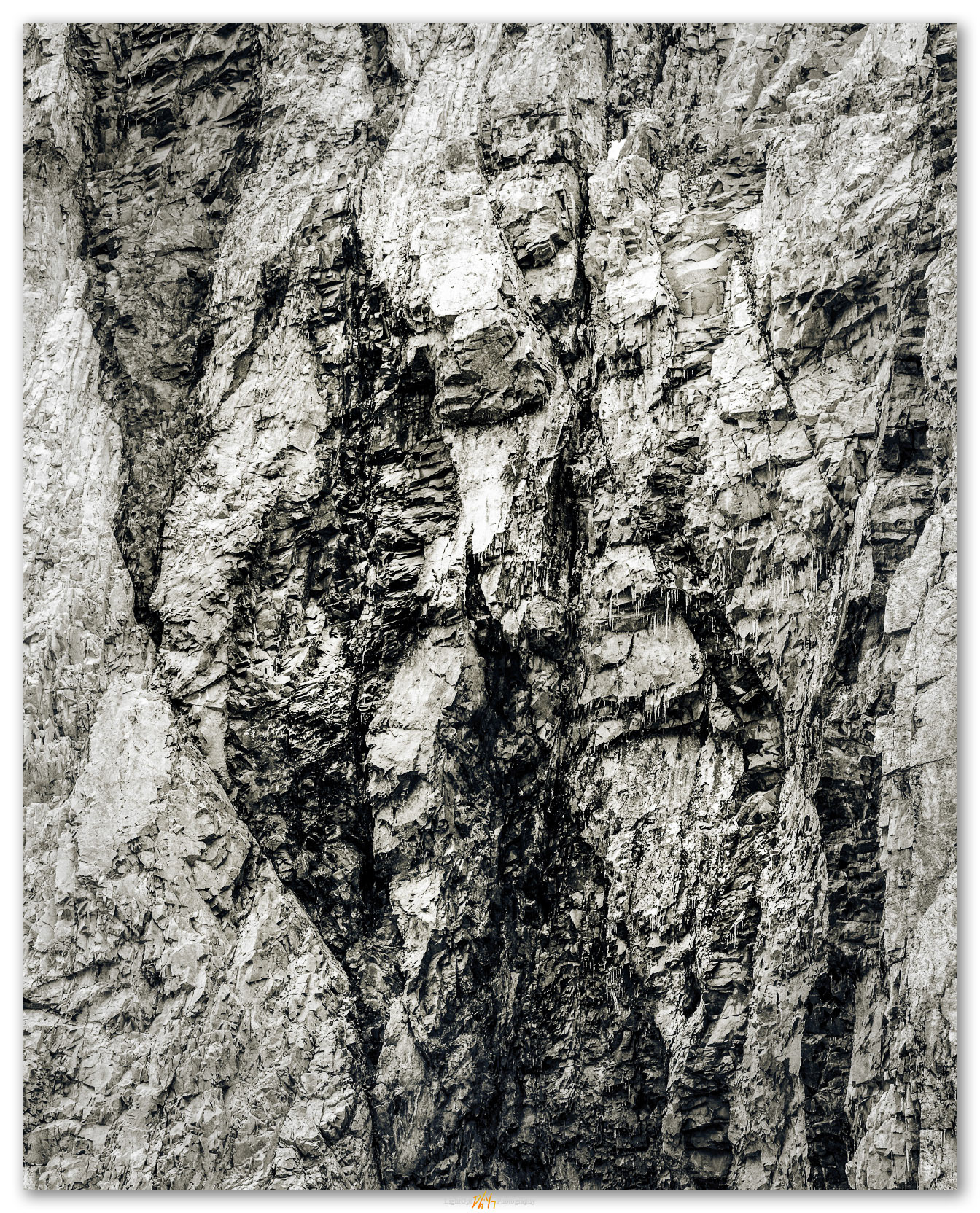 Ice on rock. Cliffs of the Antarctic Peninsula.
