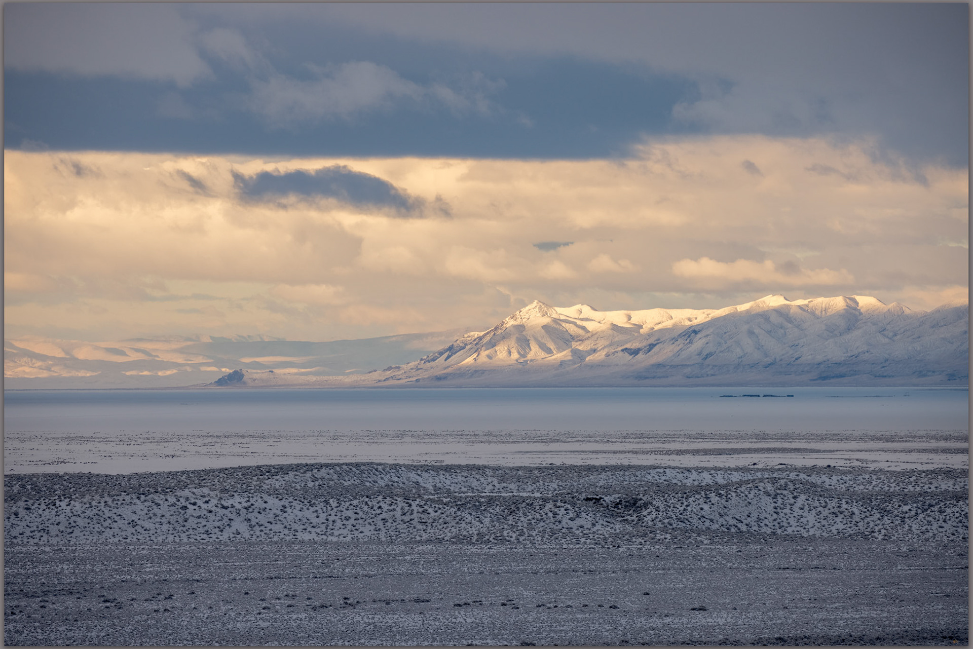 Long view. West Humboldt Range acxross the snow-covered playa, Carson Sink, Great Basin Desert, NV, USA