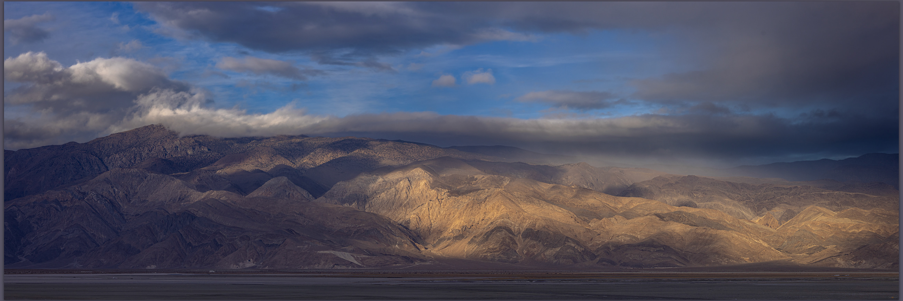 Inyo squalls. Strom clouds clearing from the Inyo Mountains, Great Basin Desert, CA, USA