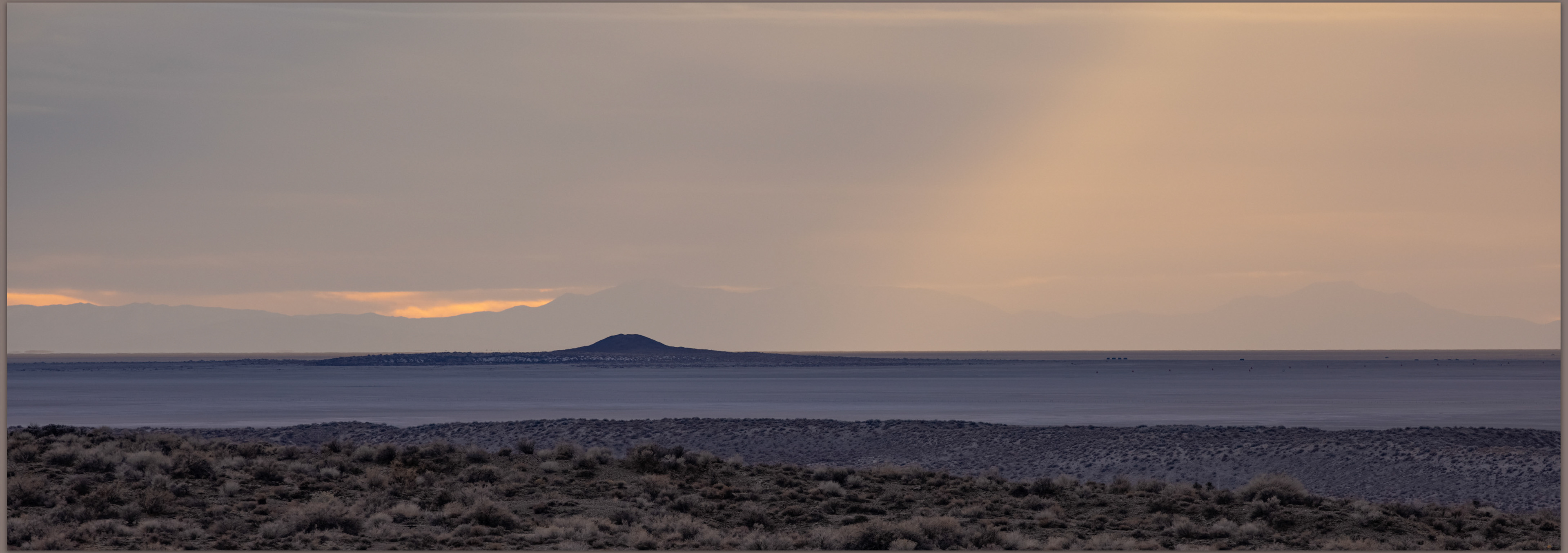 Lone Rock light. Late sun on Lone Rock, Carson Sink, Great Basin Desert, NV, USA