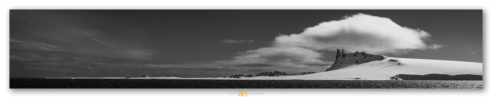 Approaching islands. First sight of South Shetlands, Drake Passage, Antarctica.