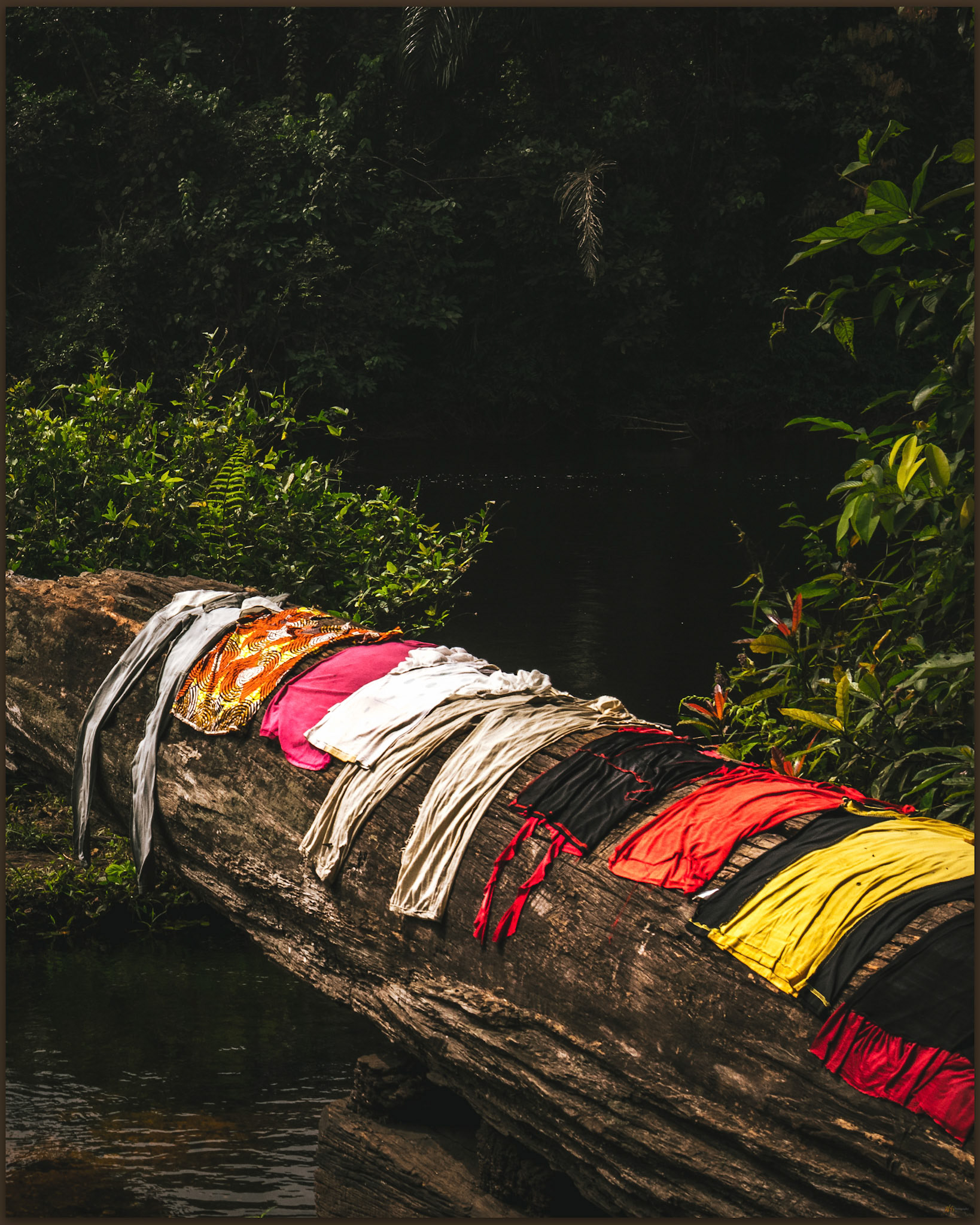 Washing day at the old bridge to Bagbaya, Moluku Region, Central African Republic