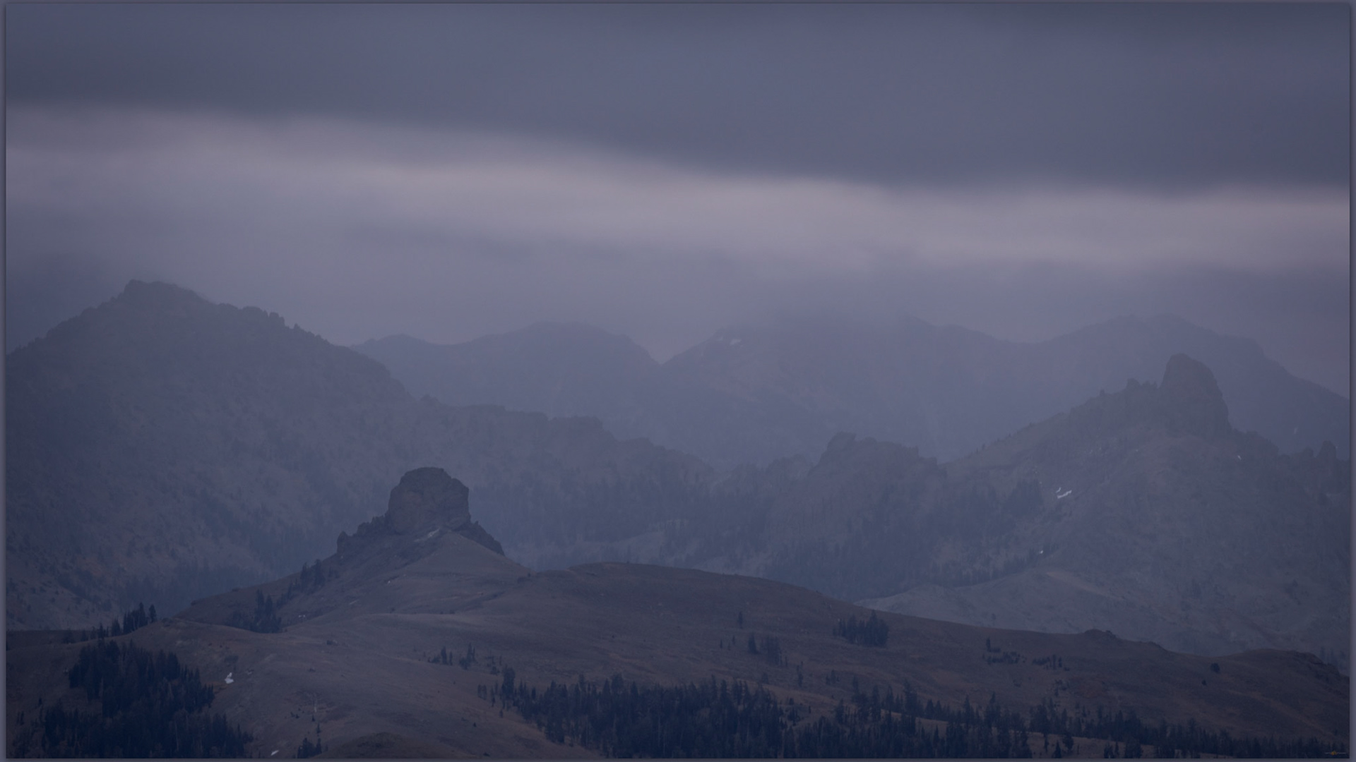 Misty mountains. This image, from the windswept ledges of Frog Lake, reminds us that winter is coming, Carson Pass, CA, USA