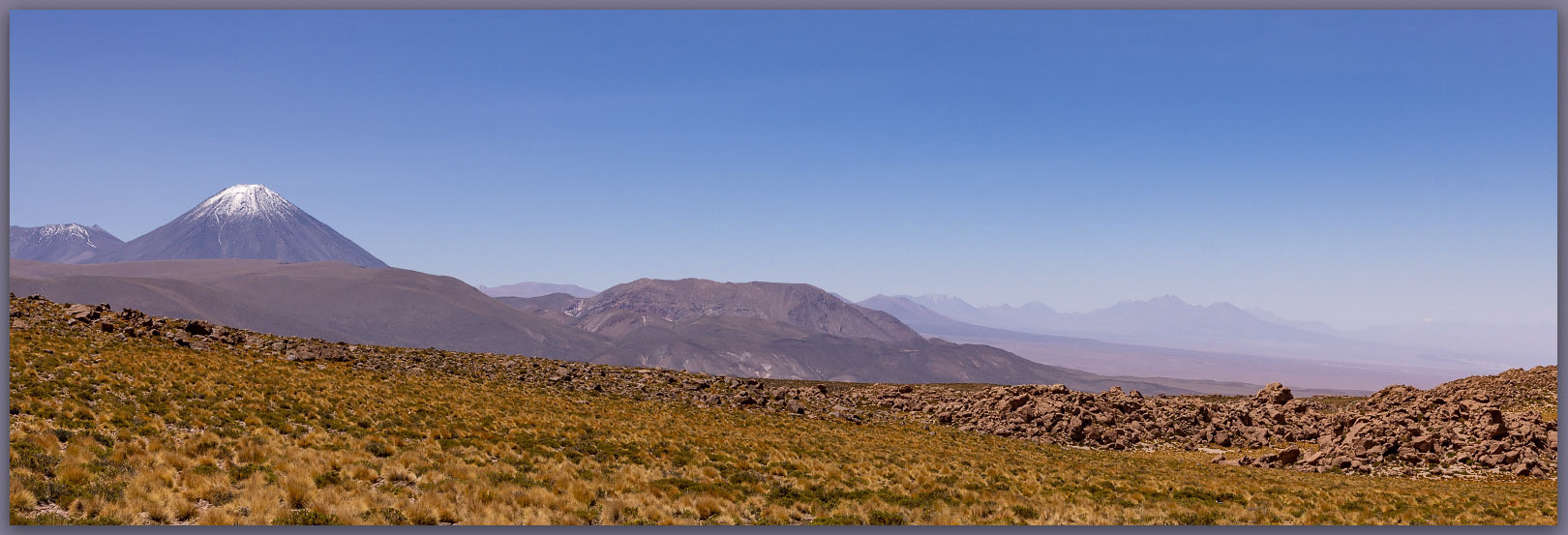 Above the salar. Volcan Liconcabur rises to 19,553 feet, looming over the Salar de Atacama, Atacama Desert, Chile
