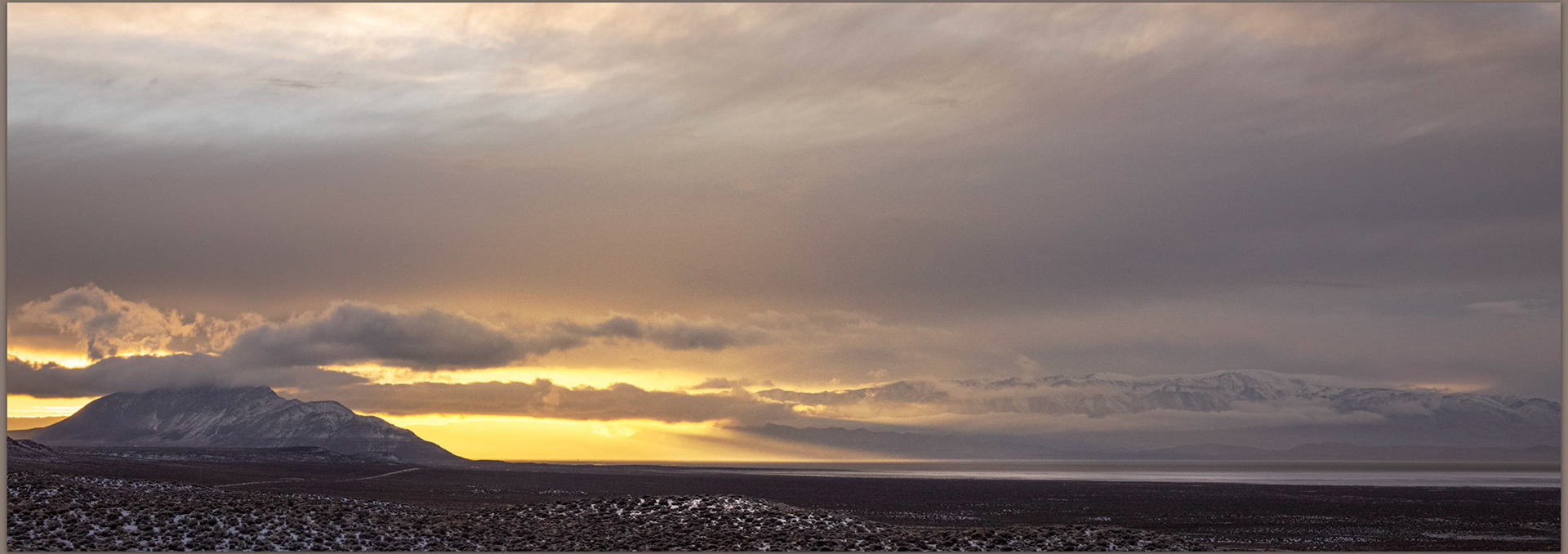 As the storm receded in allowed the sunset to spread into the playa, Black Rock Desert, Great Basin Desert, Nevada, USA