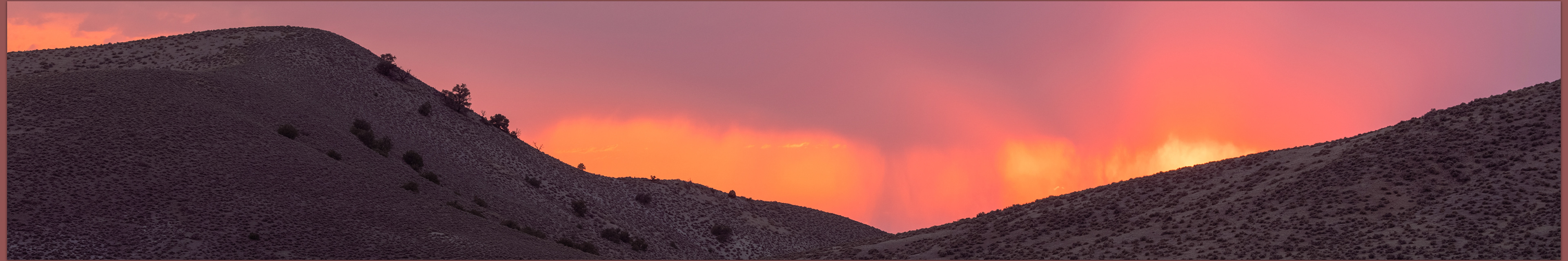 Smoke from the Beckwourth Complex wildland fire transforms a needed rain at sunset, Broken Hills, Great Basin Desert, Nevada, USA