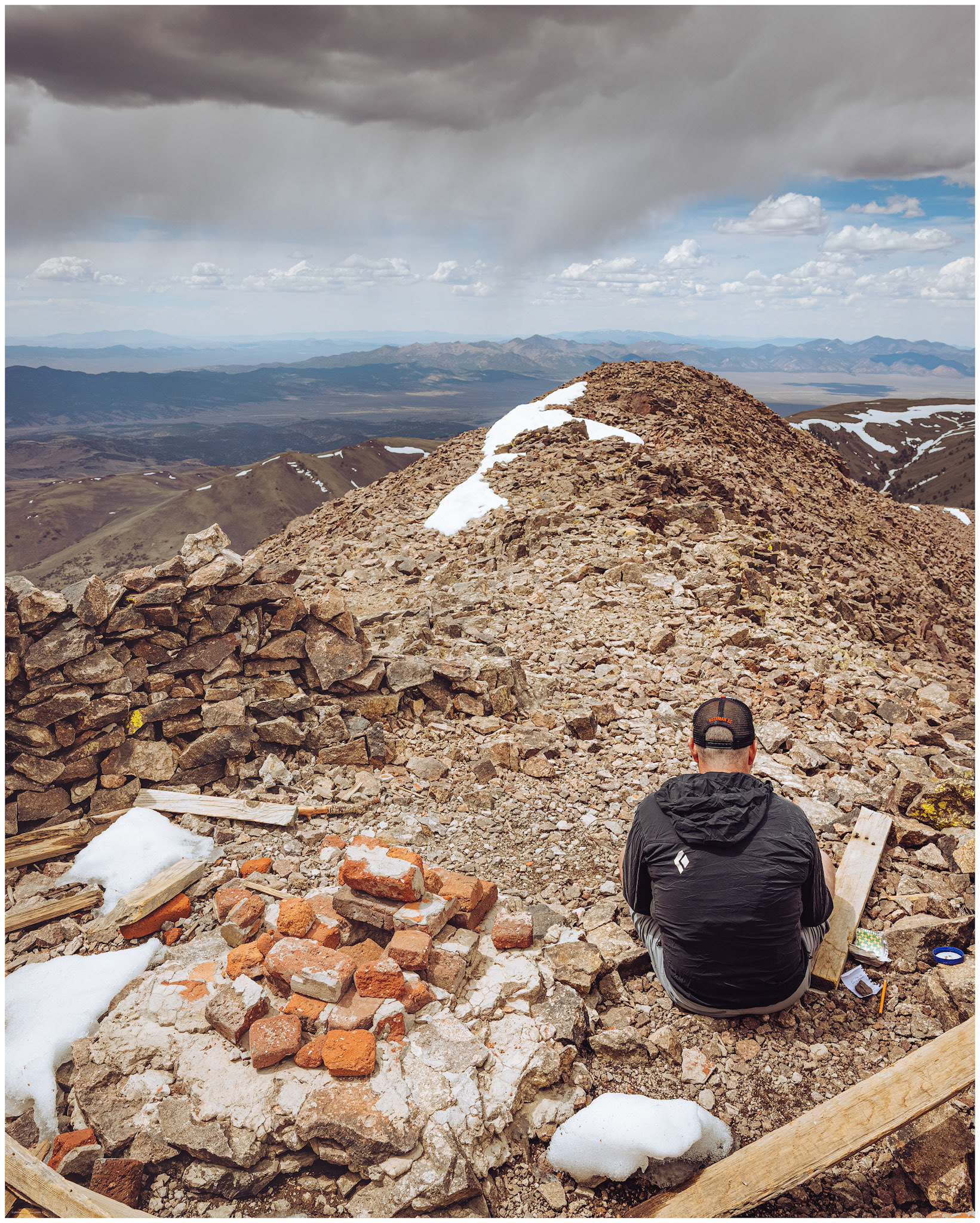 Darren checks the register, once hidden in the mapping station at the summit, Arc Dome, Toiyabe Range, Nevada.