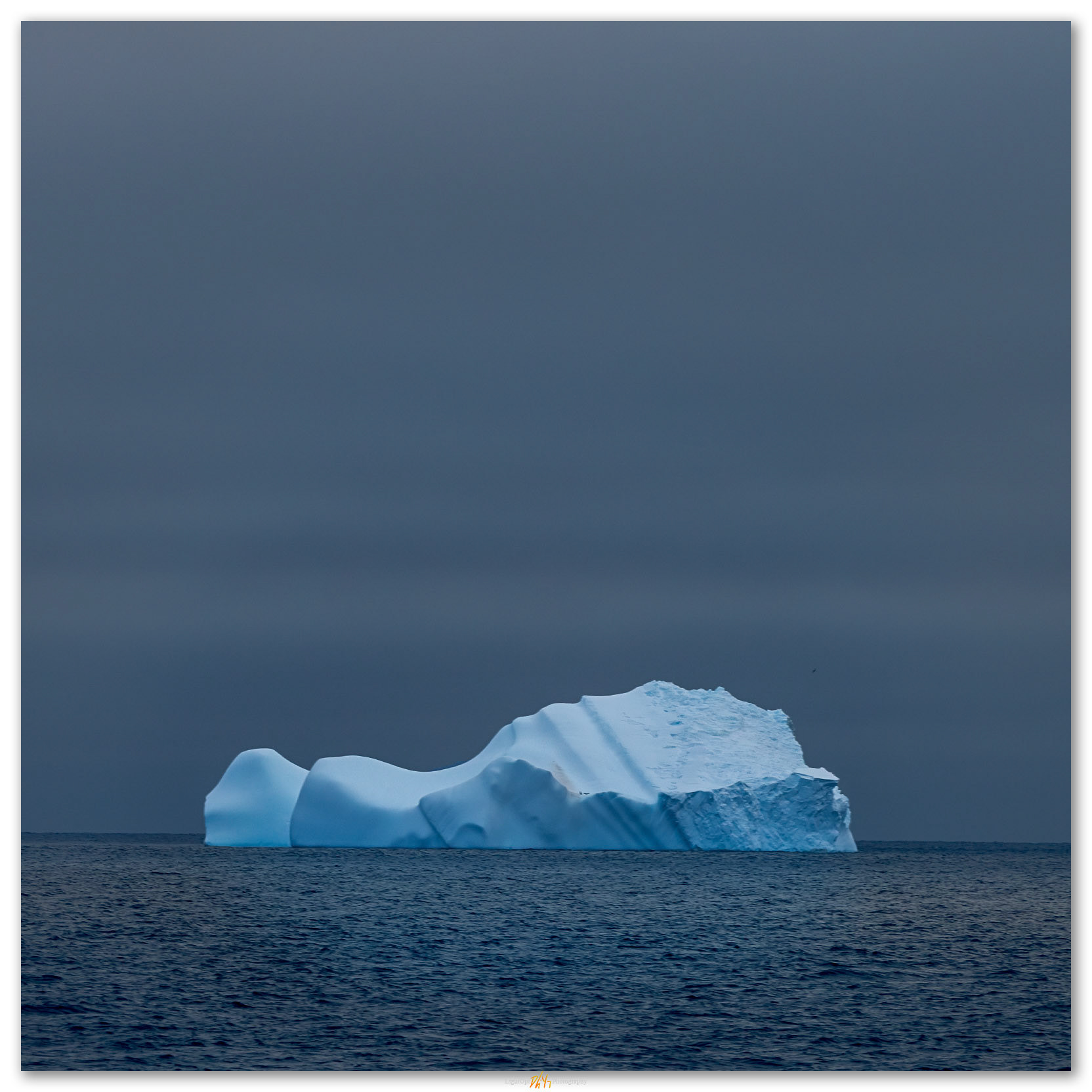 Leaning in. Iceberg off the Antarctic Peninsula, Antarctica